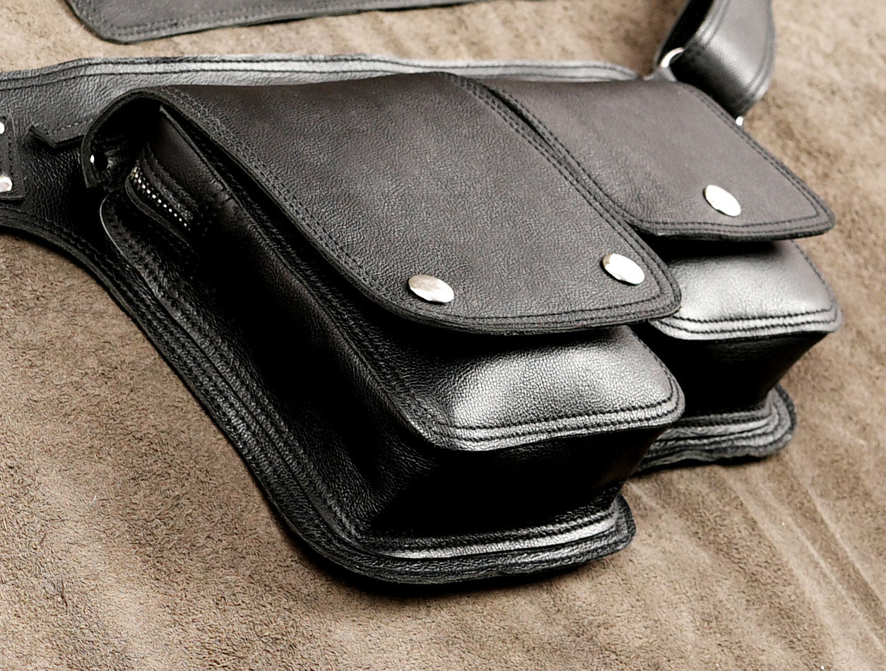 Genuine leather fanny pack styled on suede background