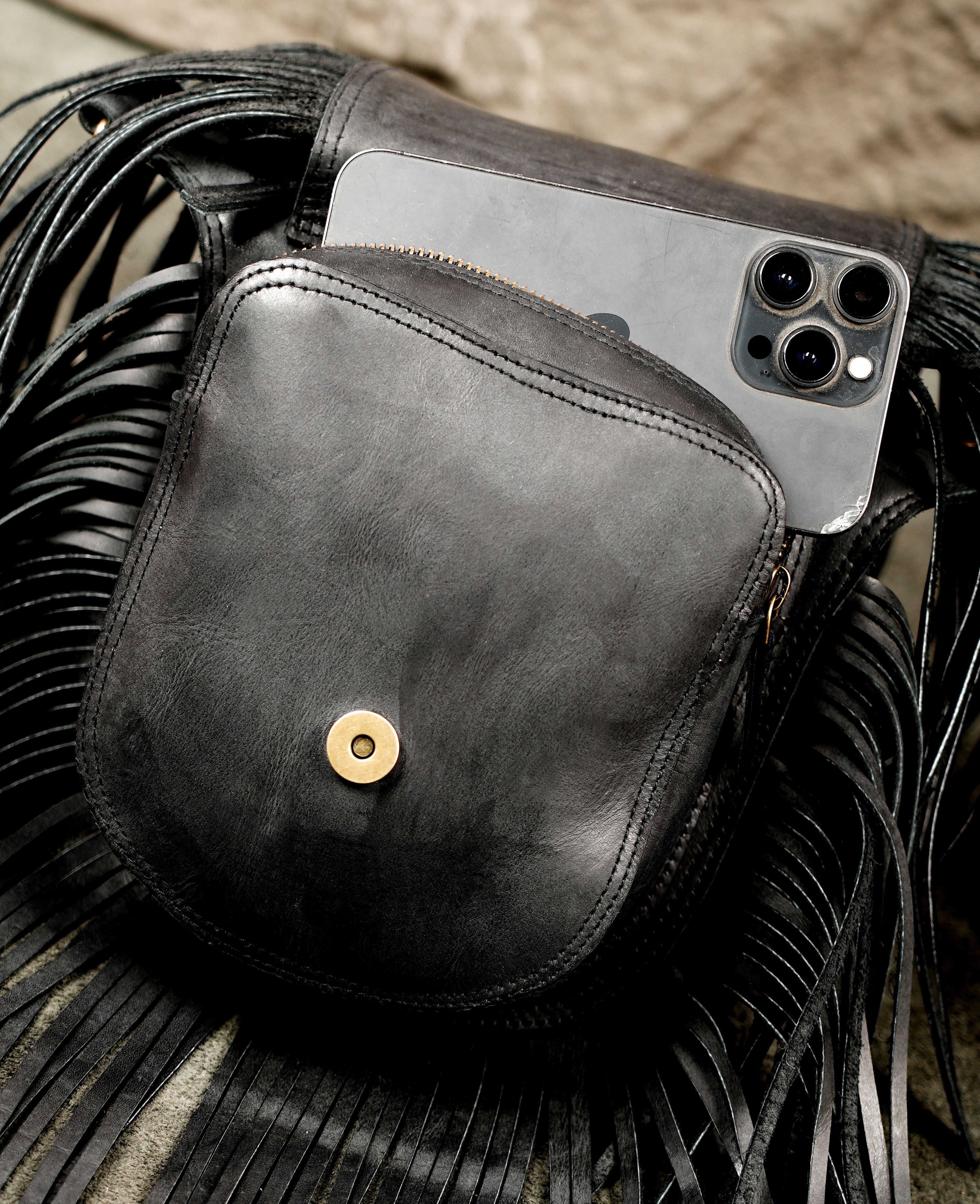 Genuine leather festival pouch with fringe and braided stone