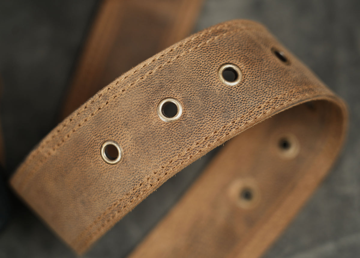 Genuine leather waist pouch styled on stone background