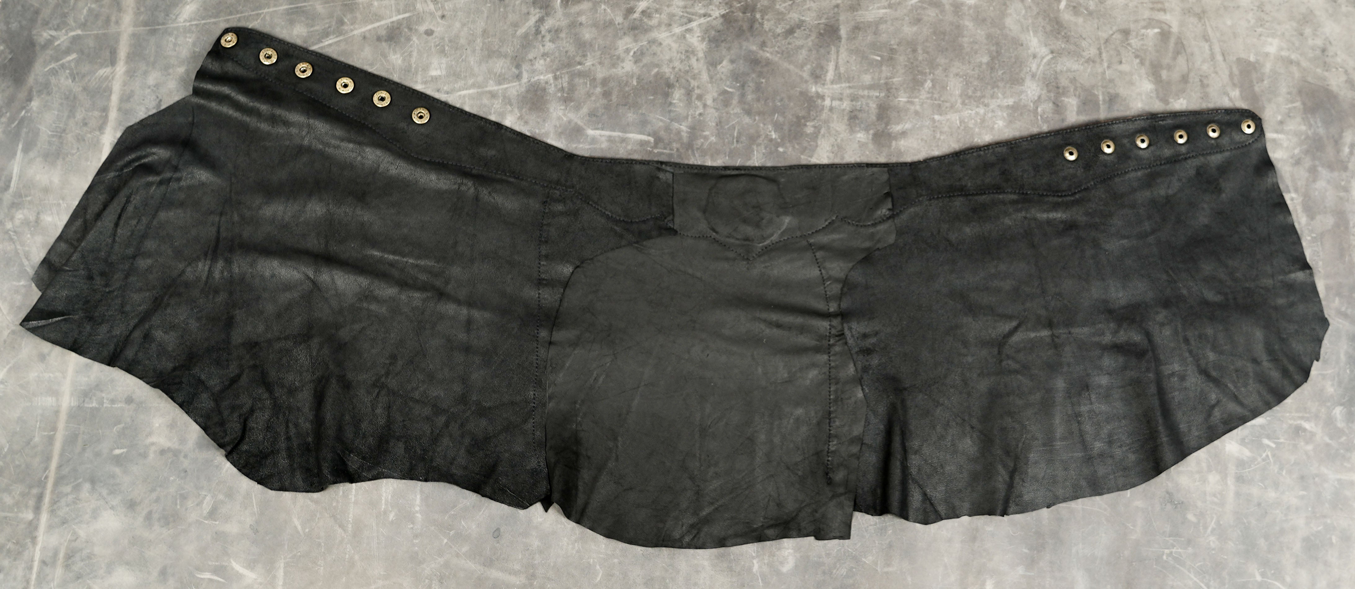 Genuine suede skirt with Om symbol, close up on waistband