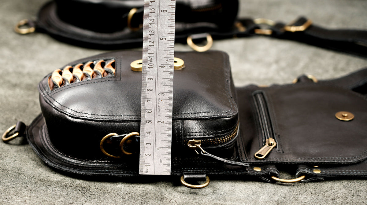 Black Leather Crossbody Holster Rig with Two Decorative Pouches and Metal Rings
