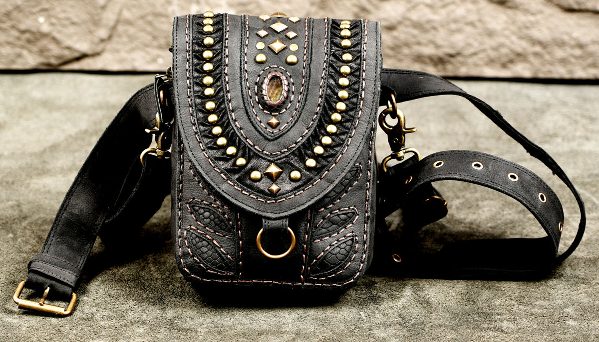 Black genuine leather hip bag with pink contrast stitching and brass rivetsBlack genuine leather hip bag with pink contrast stitching and brass rivets