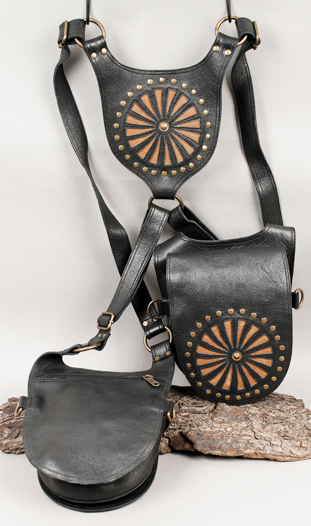 Black leather double pouch bag with sunburst studded detailing