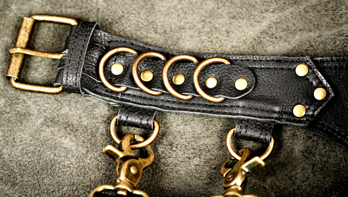Black leather waist belt with natural stone pockets and antique brass hardware