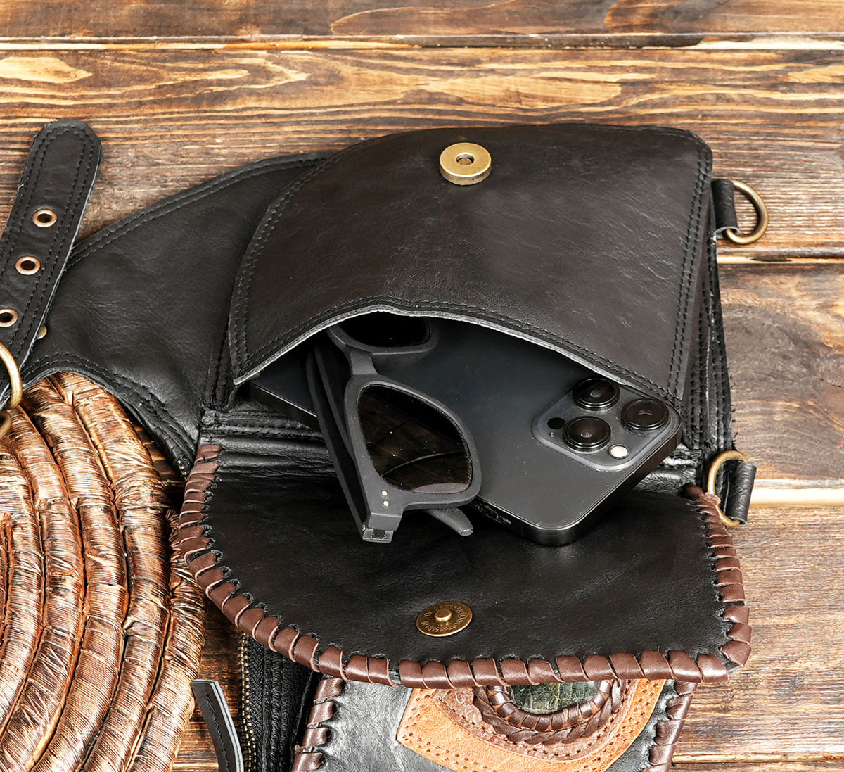 Leather shoulder bag harness with adjustable straps and metal buckles