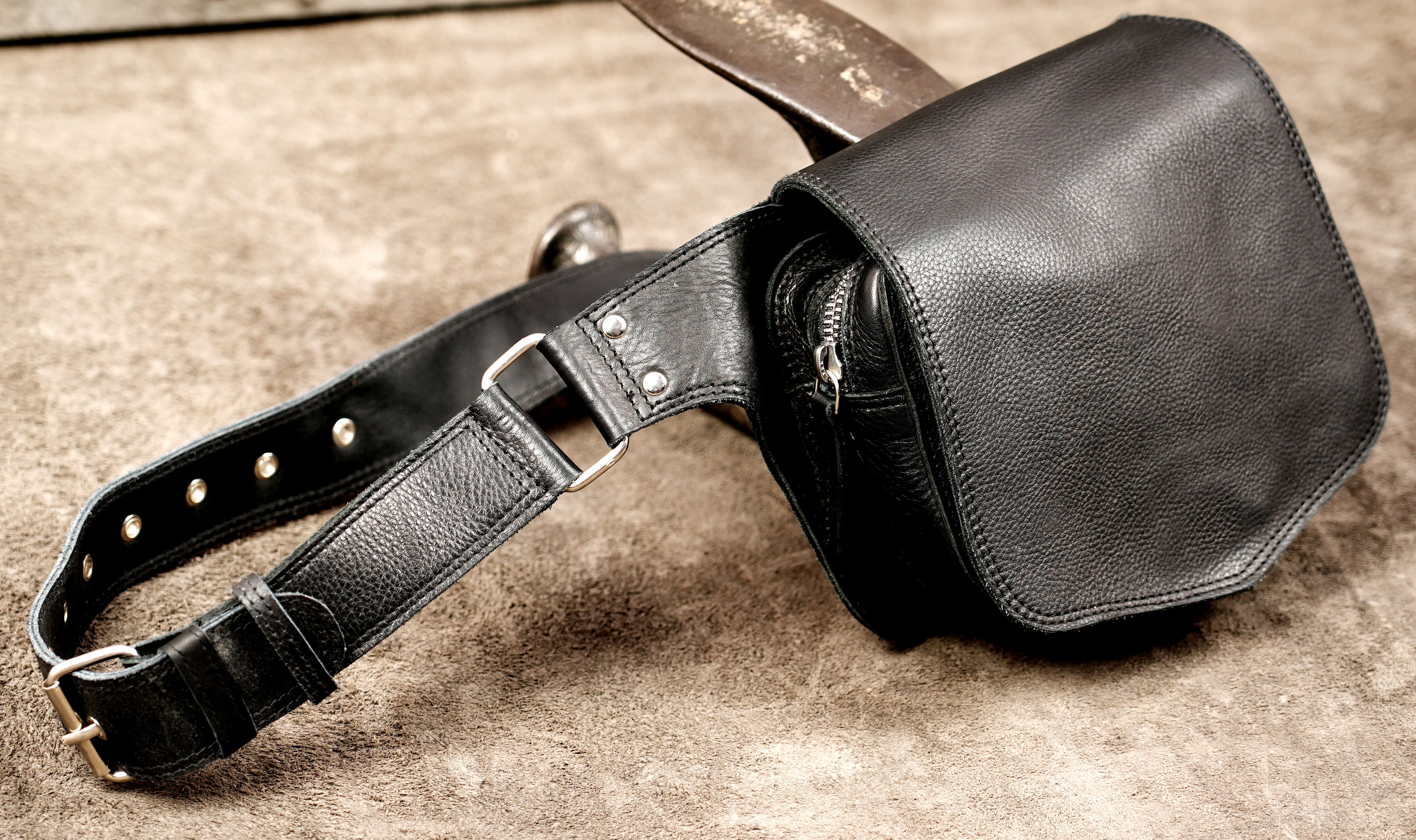 Handcrafted leather fanny pack with clean pointed flap