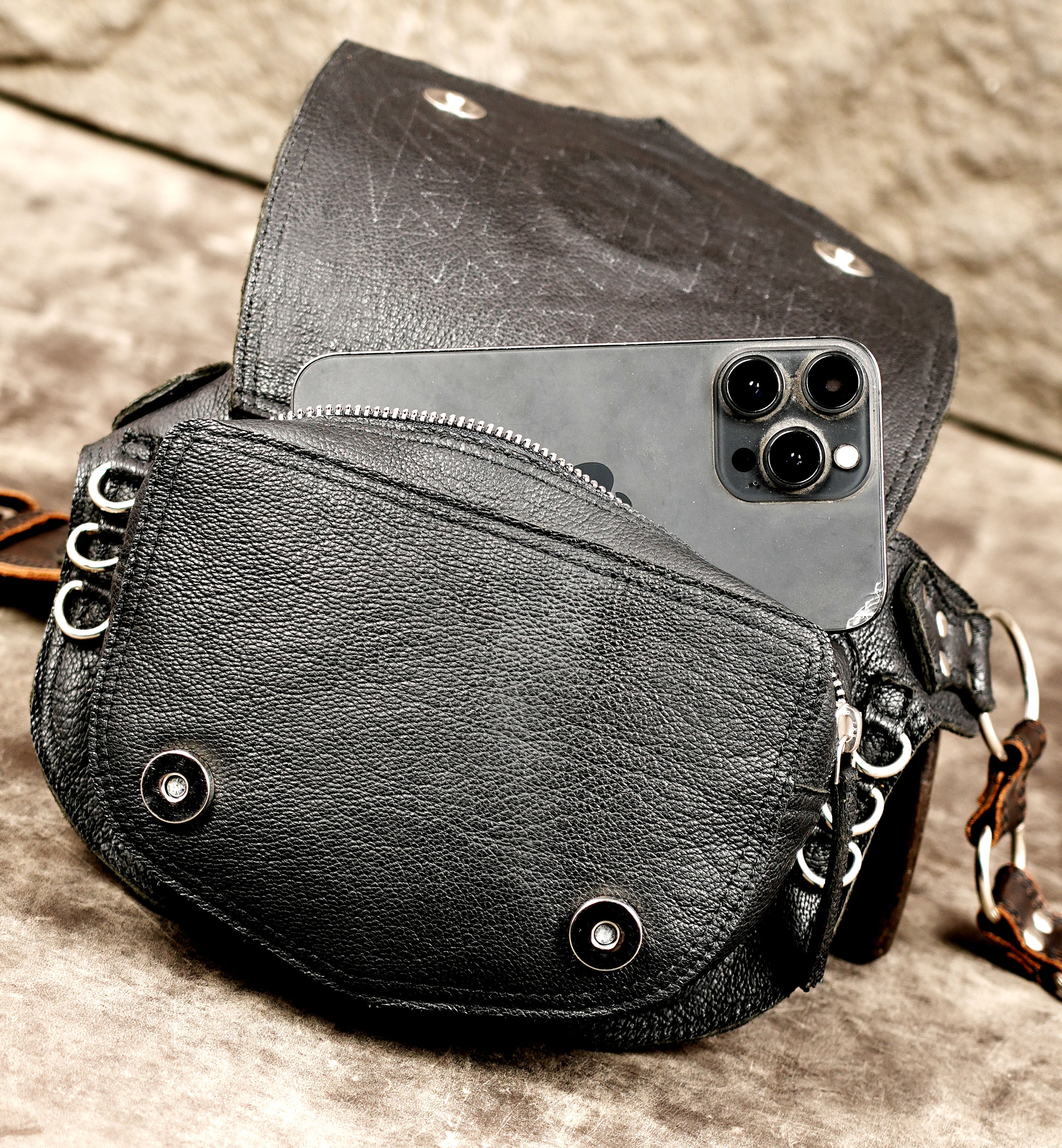 Handcrafted leather pack with geometric weave pattern