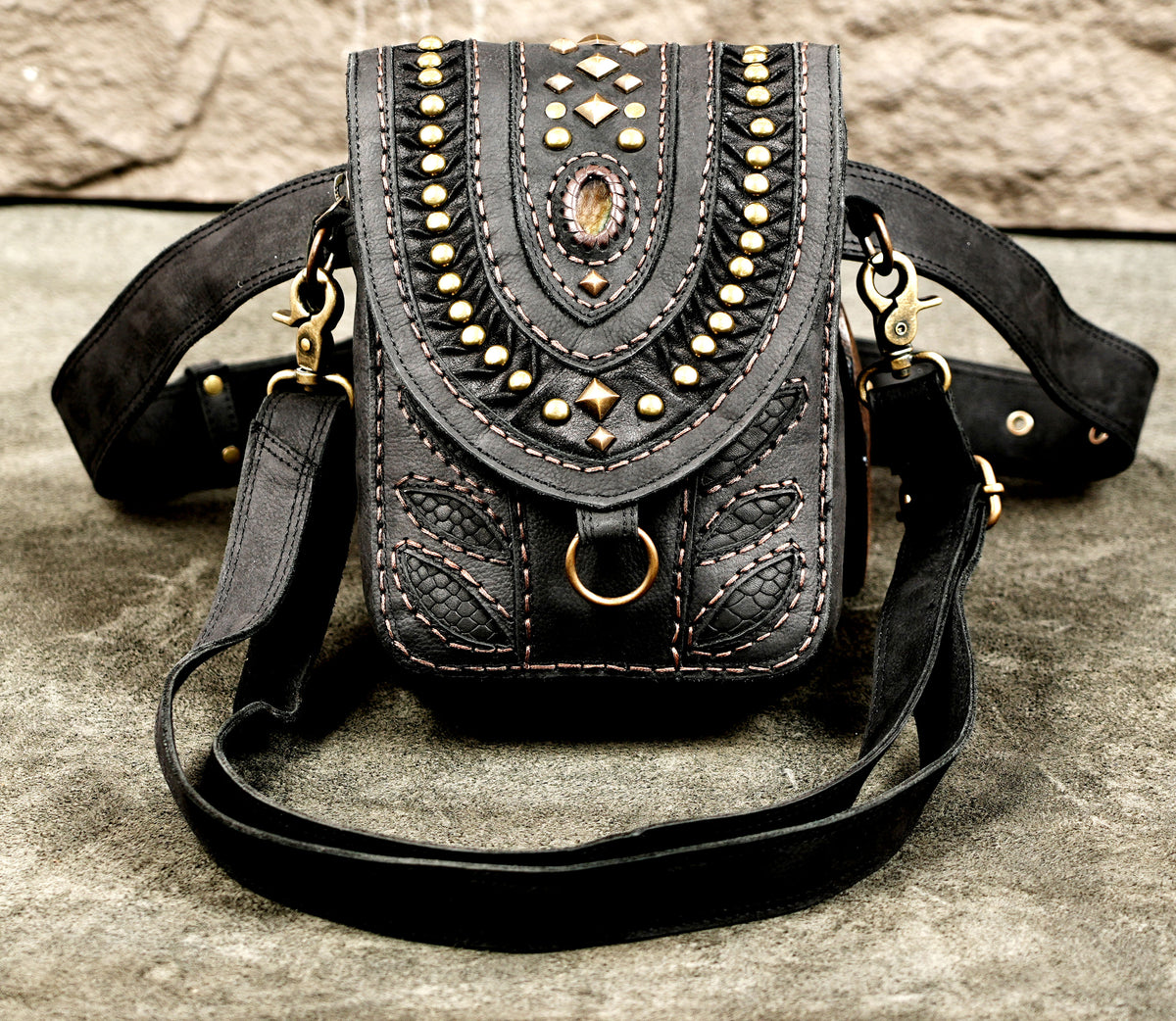 Gothic black leather utility pouch with studded front flap and buckle belt