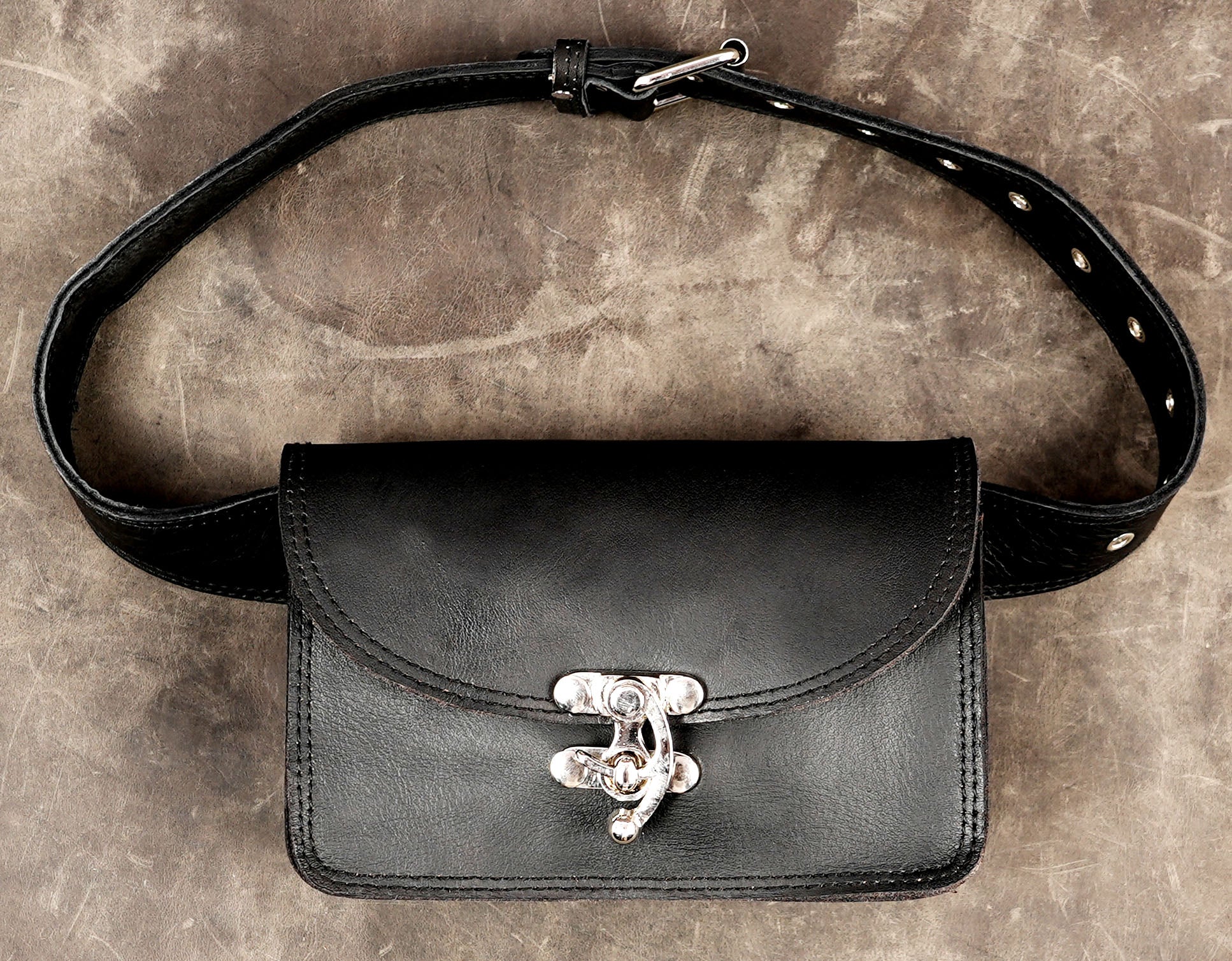 Handmade black leather belt bag with silver turn lock clasp