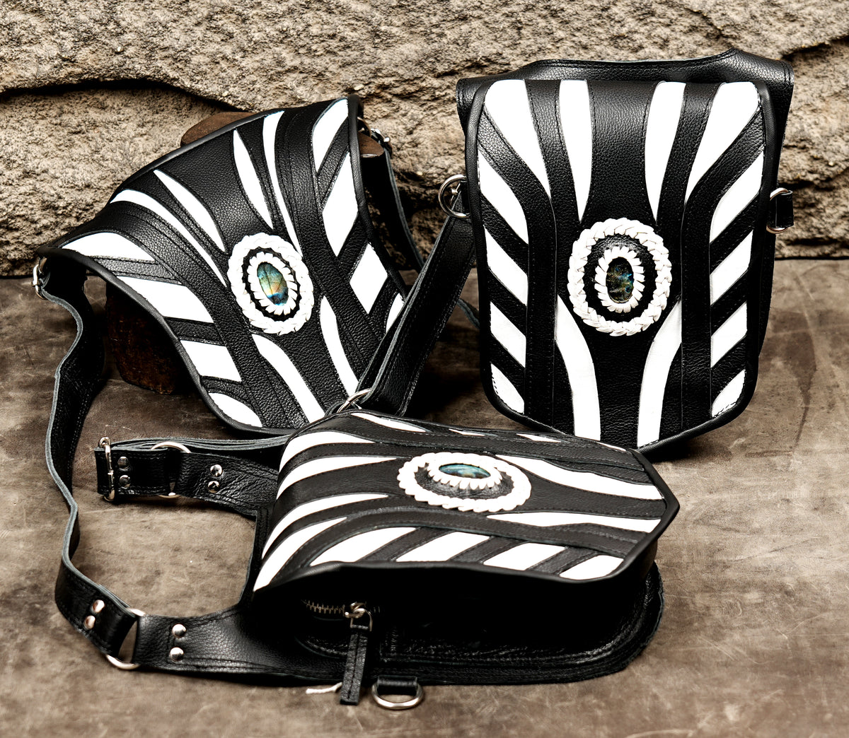 Handmade black leather body bag with contrasting white accents