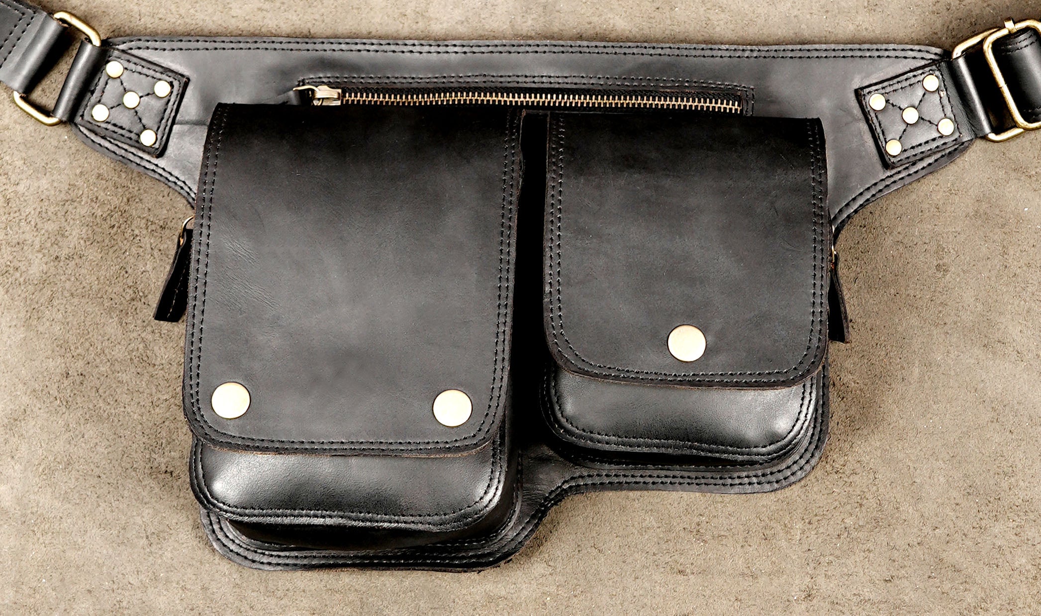 Handmade black leather fanny pack with double snap pockets