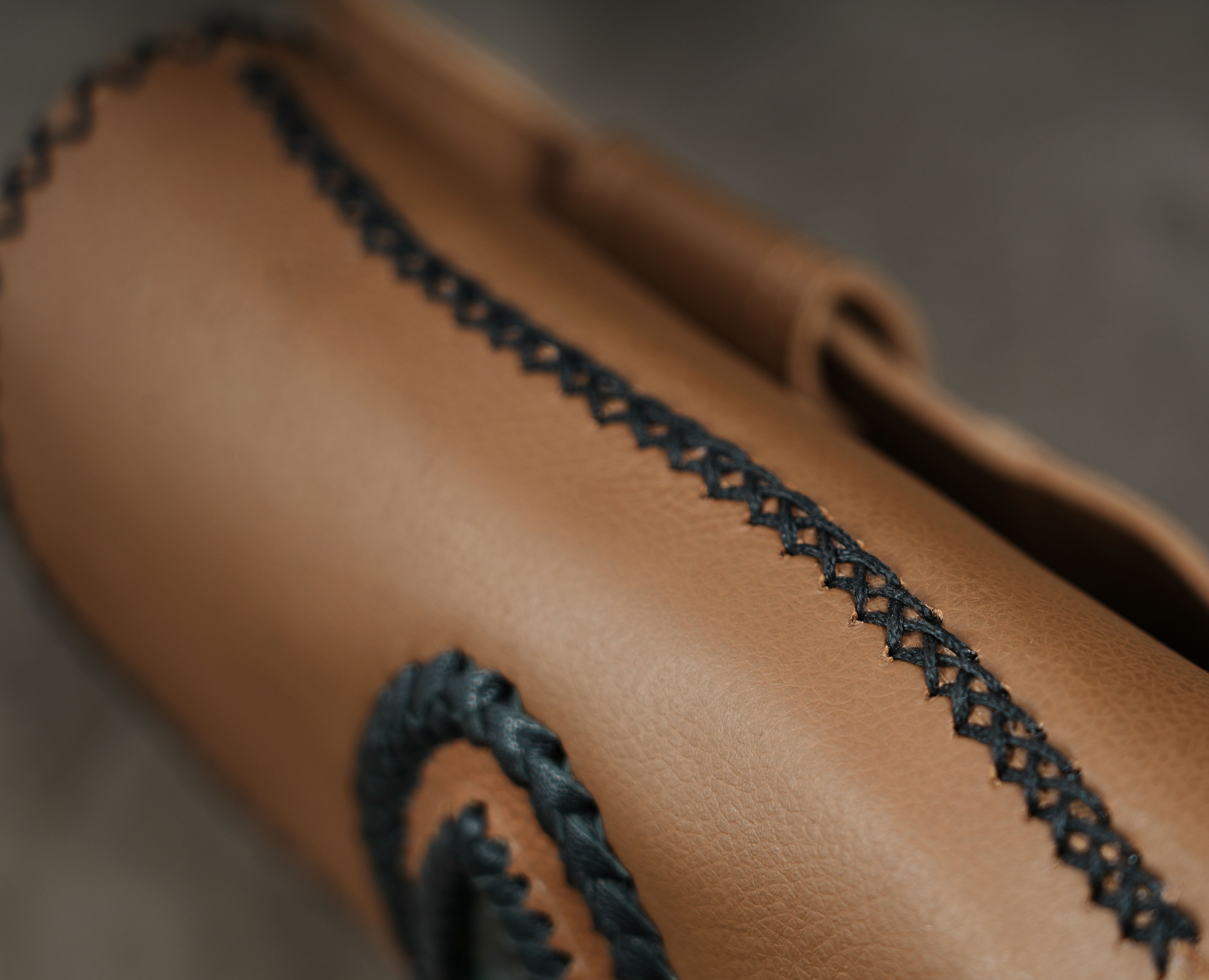 Handmade gemstone waist pouch with black stitching
