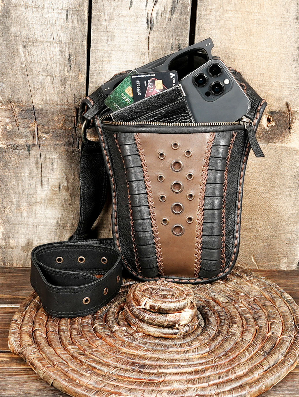 Handmade leather fanny pack with brown eyelet front panel