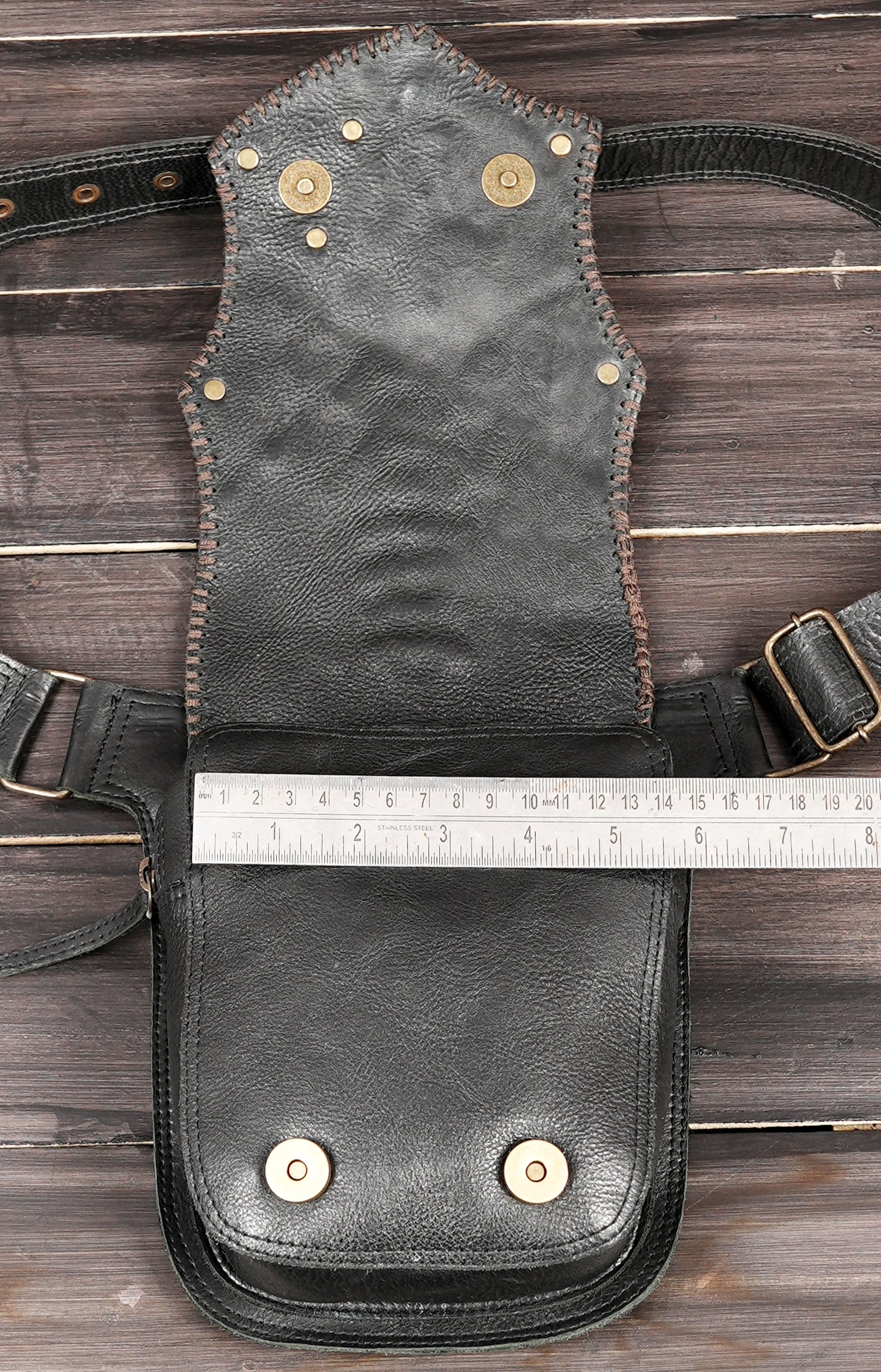 Handmade leather festival bag with mixed hardware and rivets