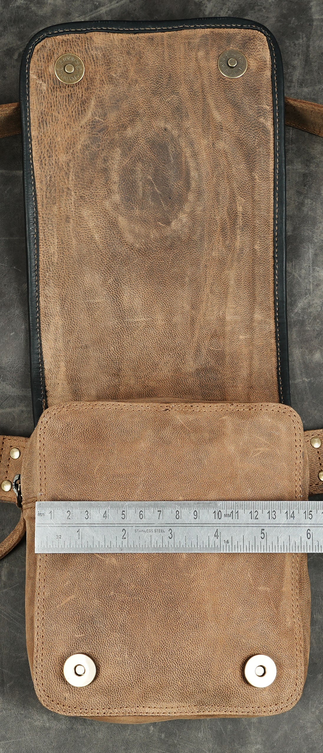 Handmade leather festival bag with snakeskin print panel
