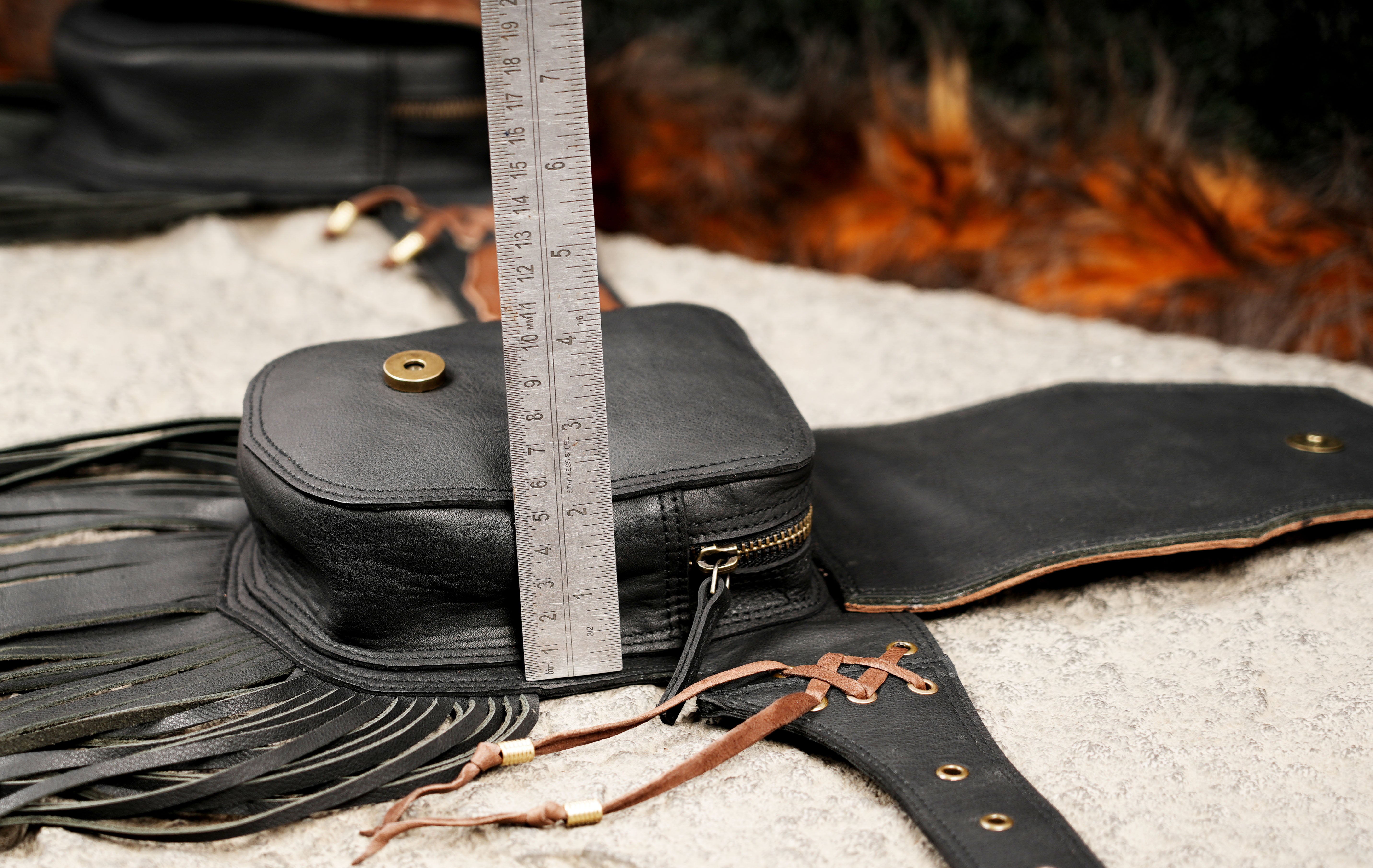 Handmade leather festival belt with lace up center detail