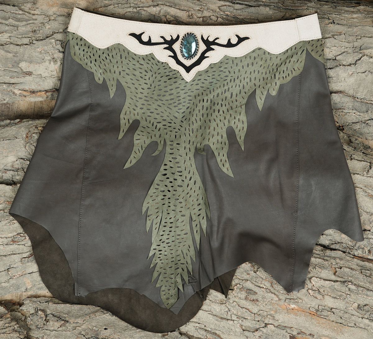 Handmade leather forest skirt with antler design and stone