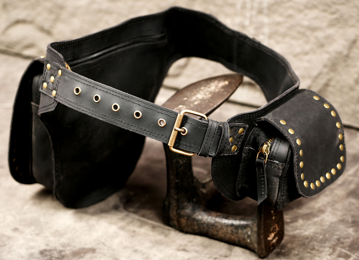 Handmade leather hip belt with zip pocket and snap flap