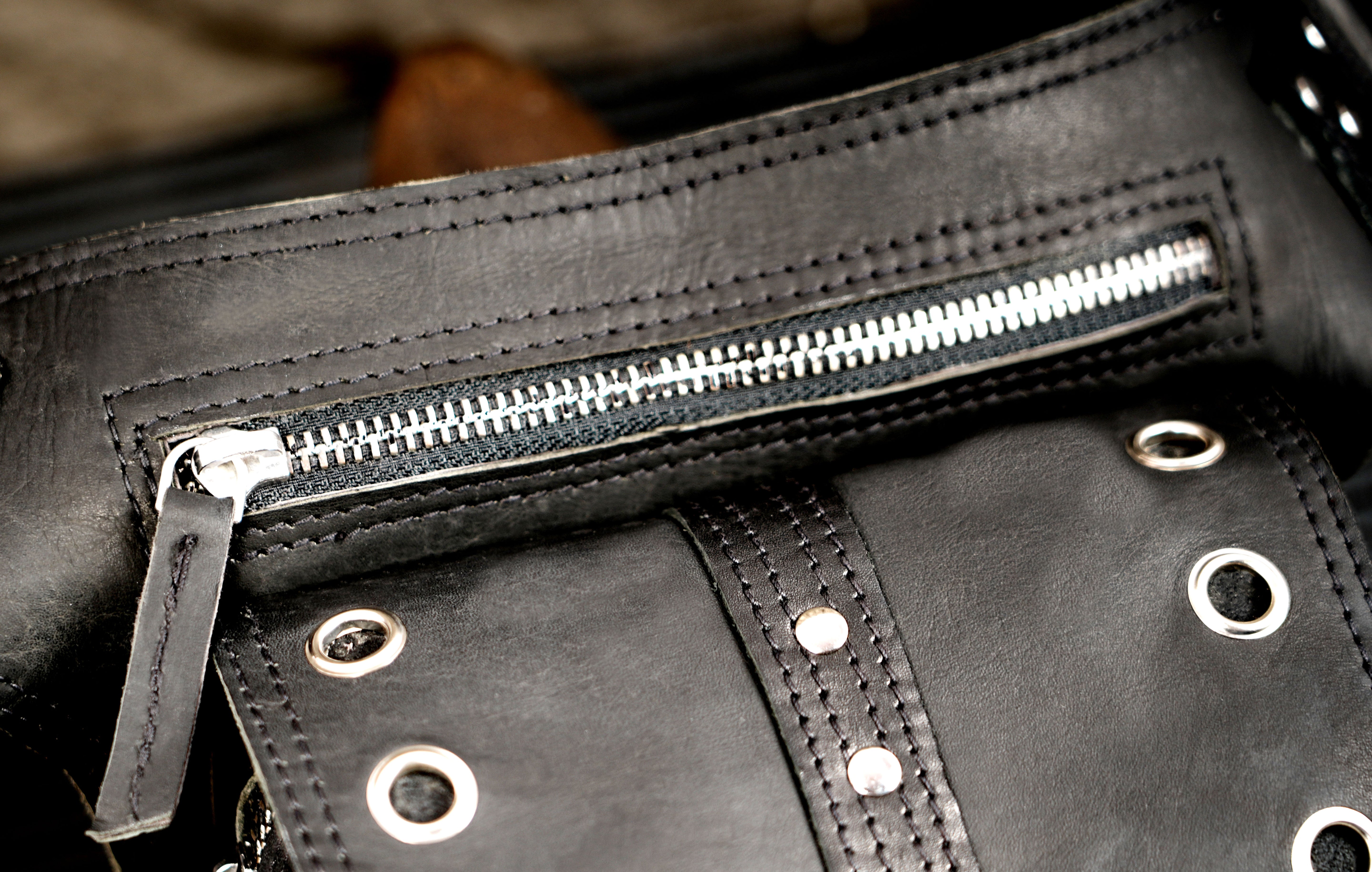Handmade leather utility waist pouch with antique brass details