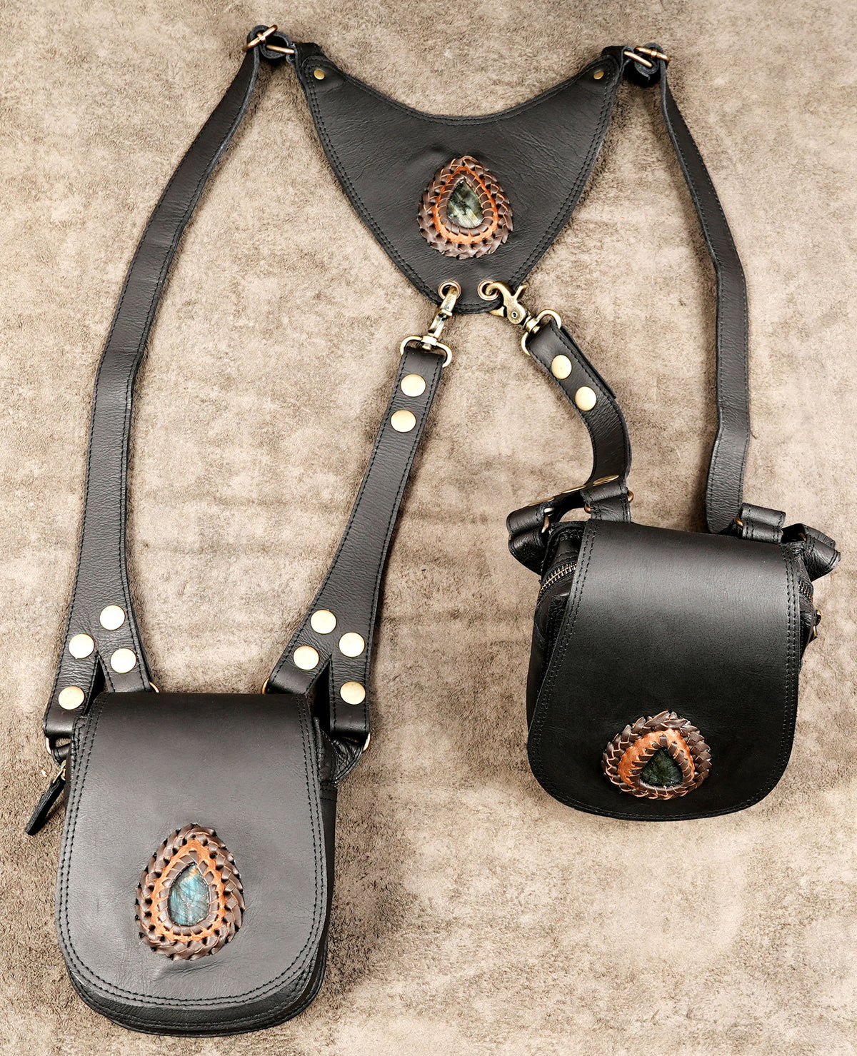 Double pouch leather harness with metal clips and adjustable shoulder straps