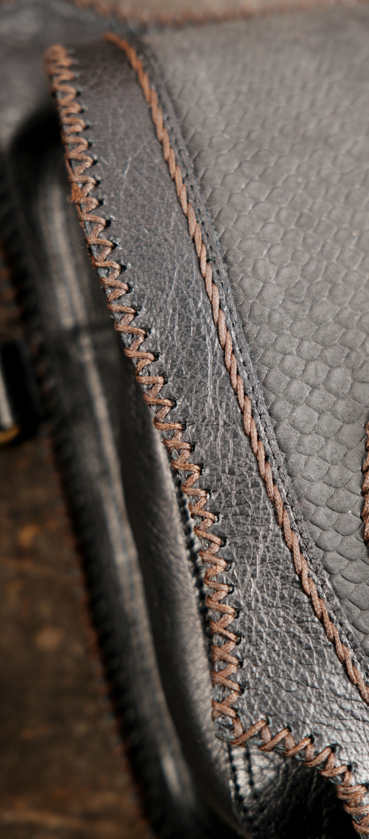 Artisan crafted leather double shoulder bag with natural stone centerpiece