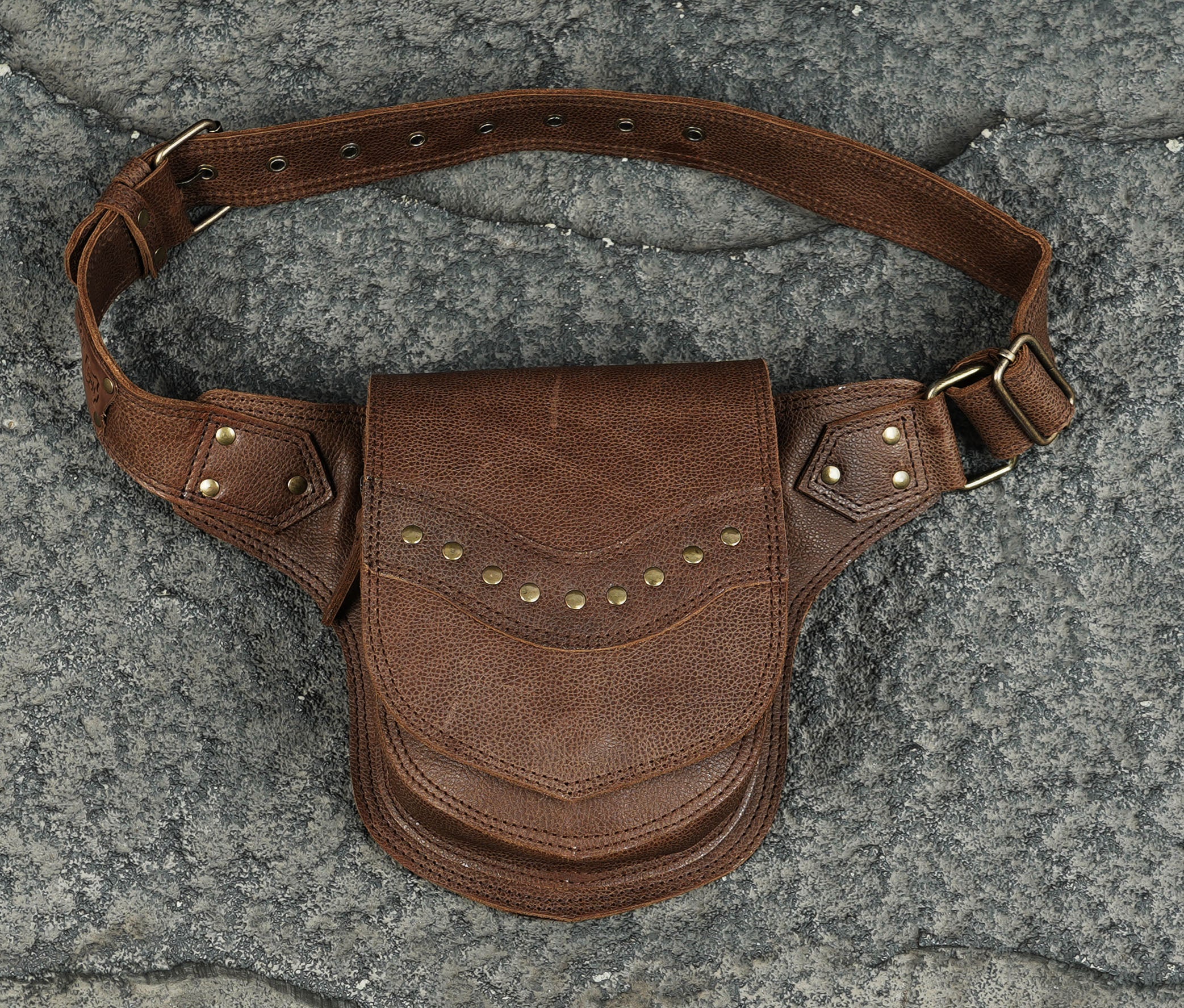 Hands-free leather travel pouch with adjustable waist belt