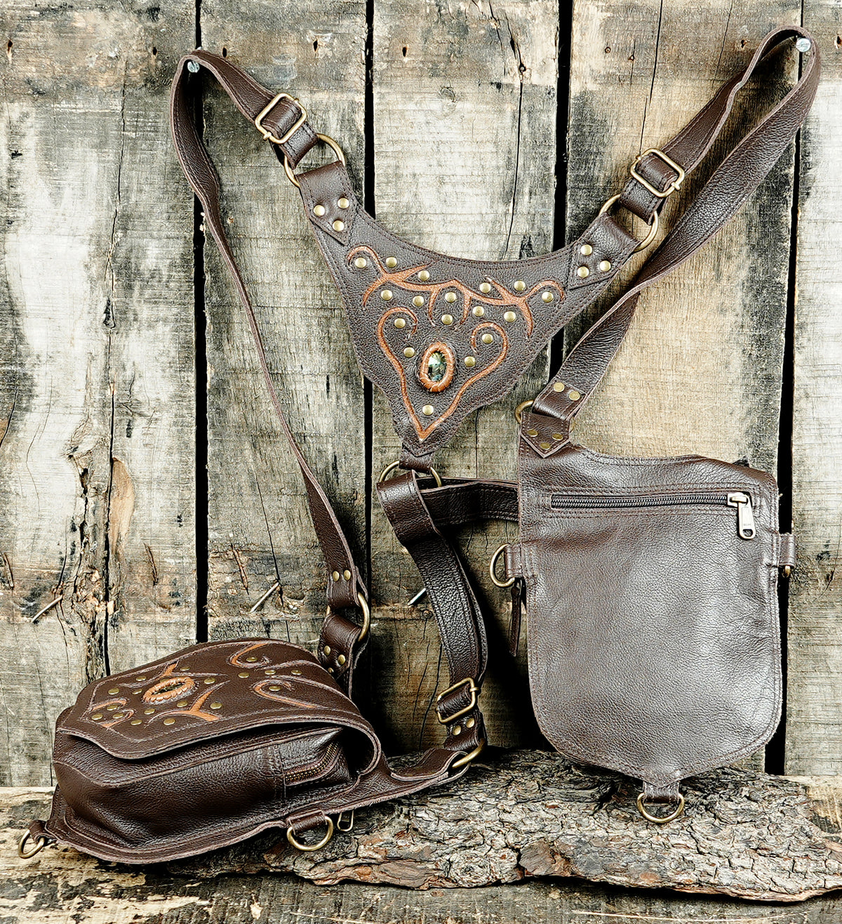 Handmade black leather utility bag with double pockets and metal strap adjusters