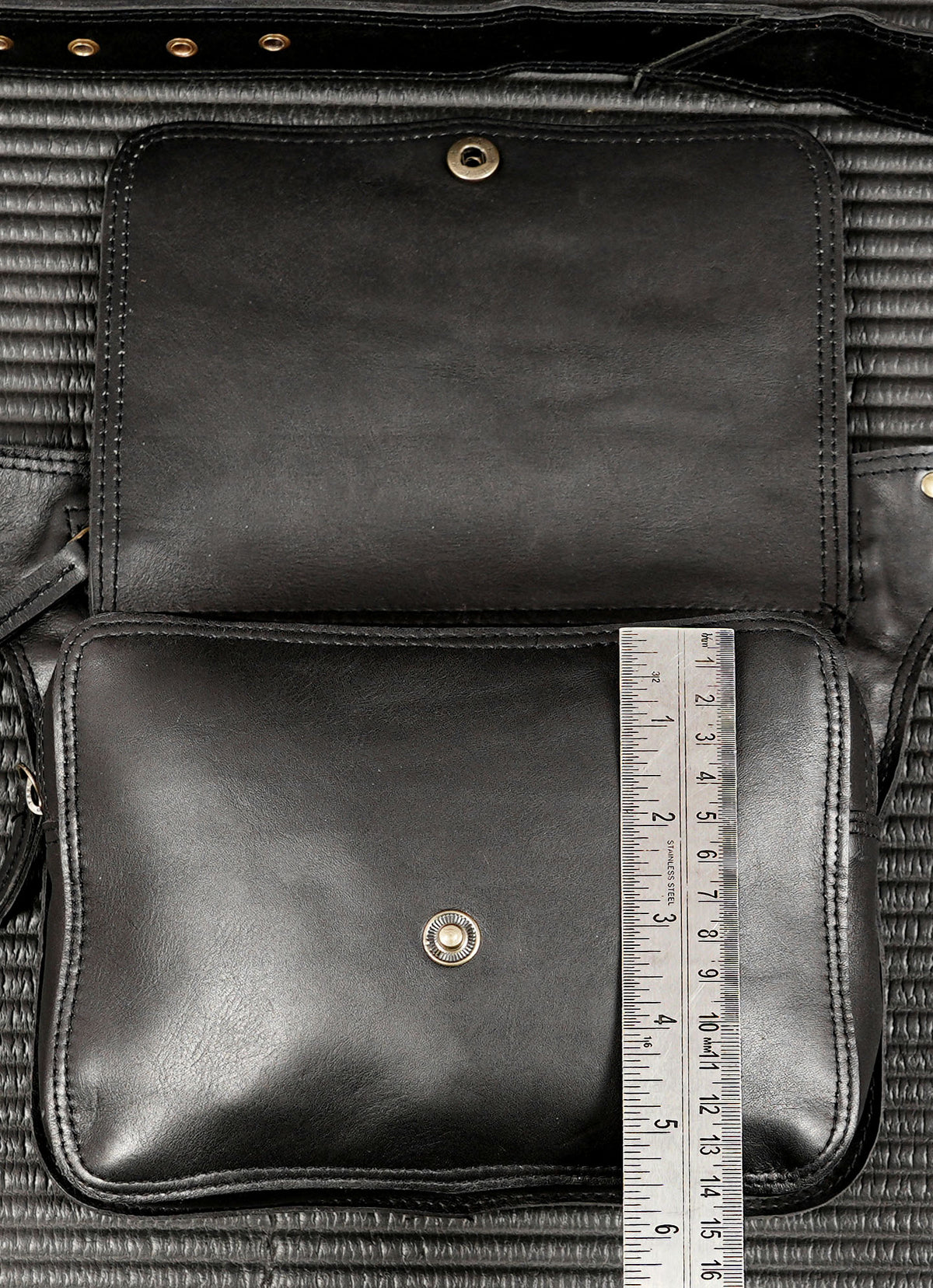 Hands free black leather waist bag for travel and festivals
