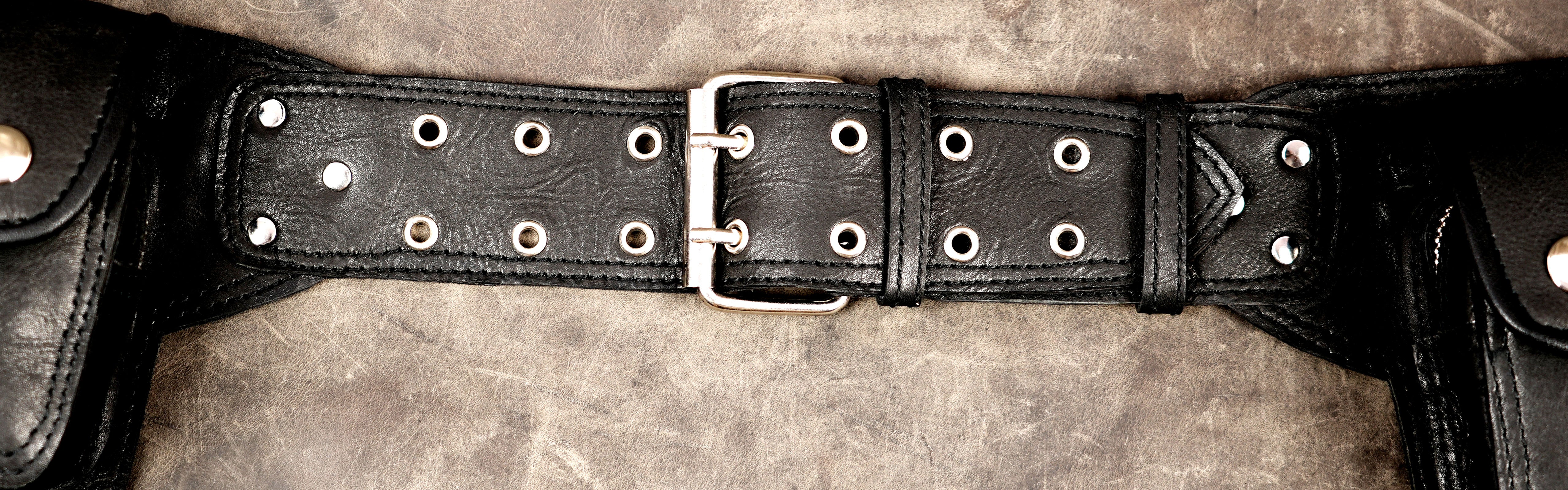Heritage style leather belt with eyelet center panel