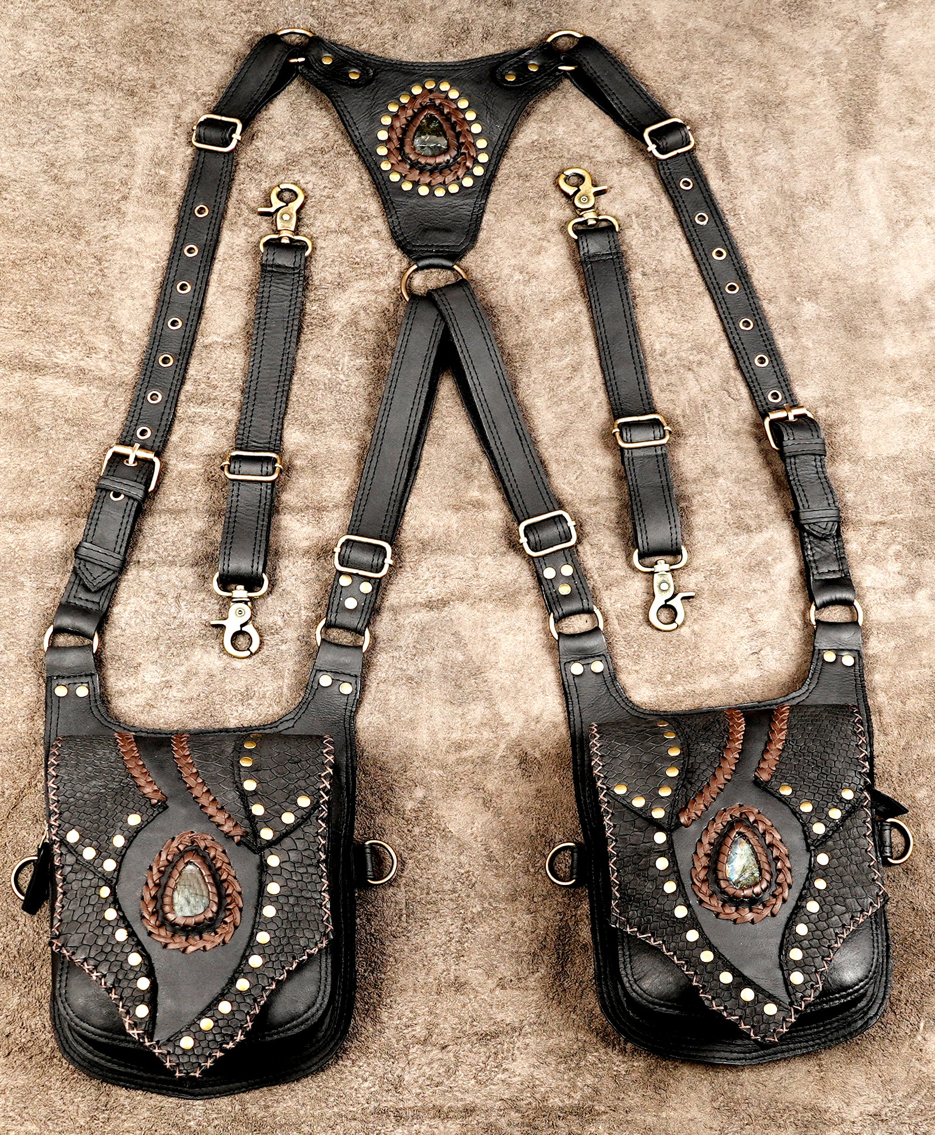 Black leather shoulder holster with gemstone detail and adjustable straps