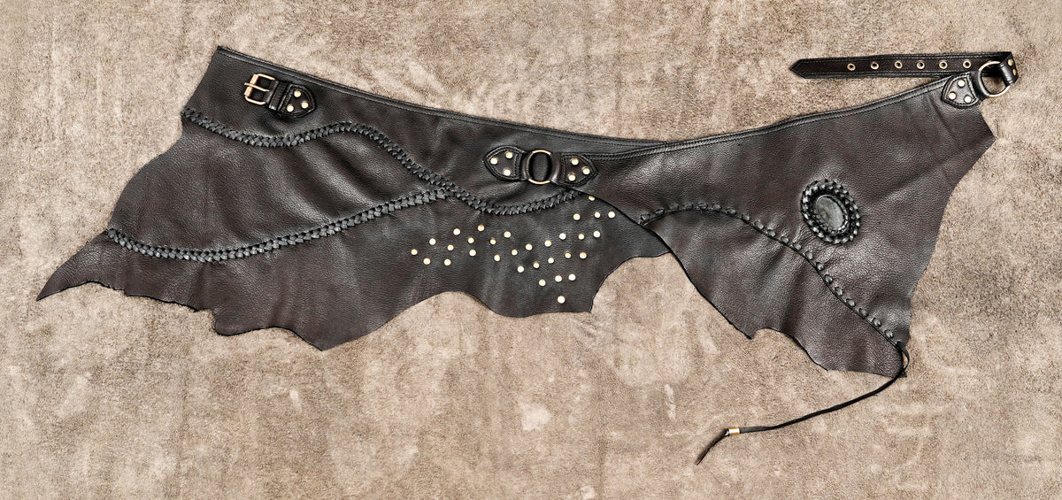 Handmade leather waist skirt with braided detailing and metal ring
