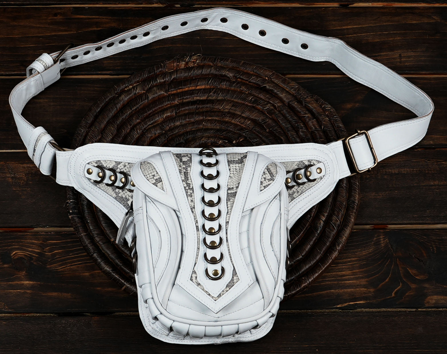 Festival ready leather waist belt bag with decorative metal elements