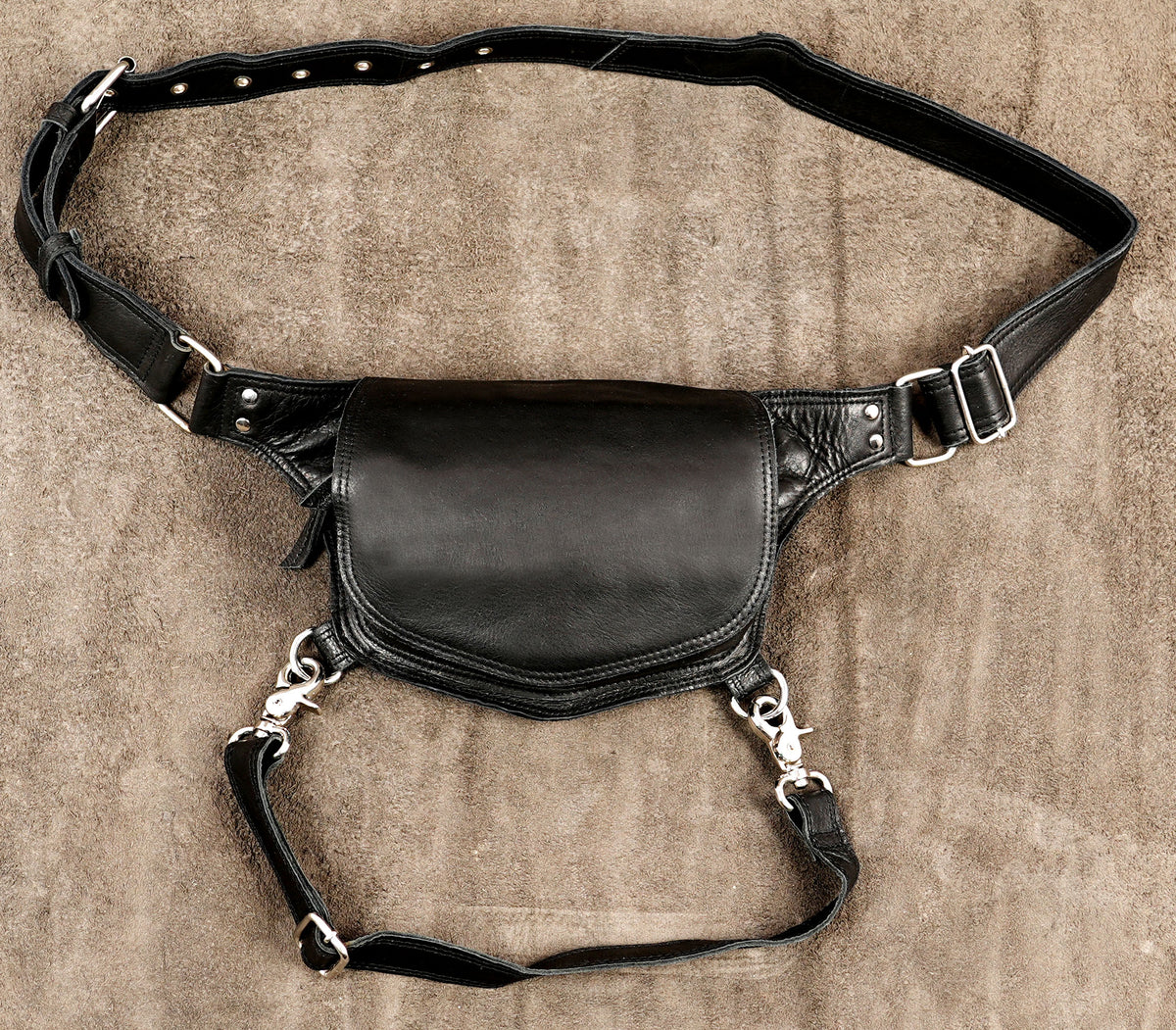 Minimalist black leather hip bag designed to keep essentials safe and close at hand