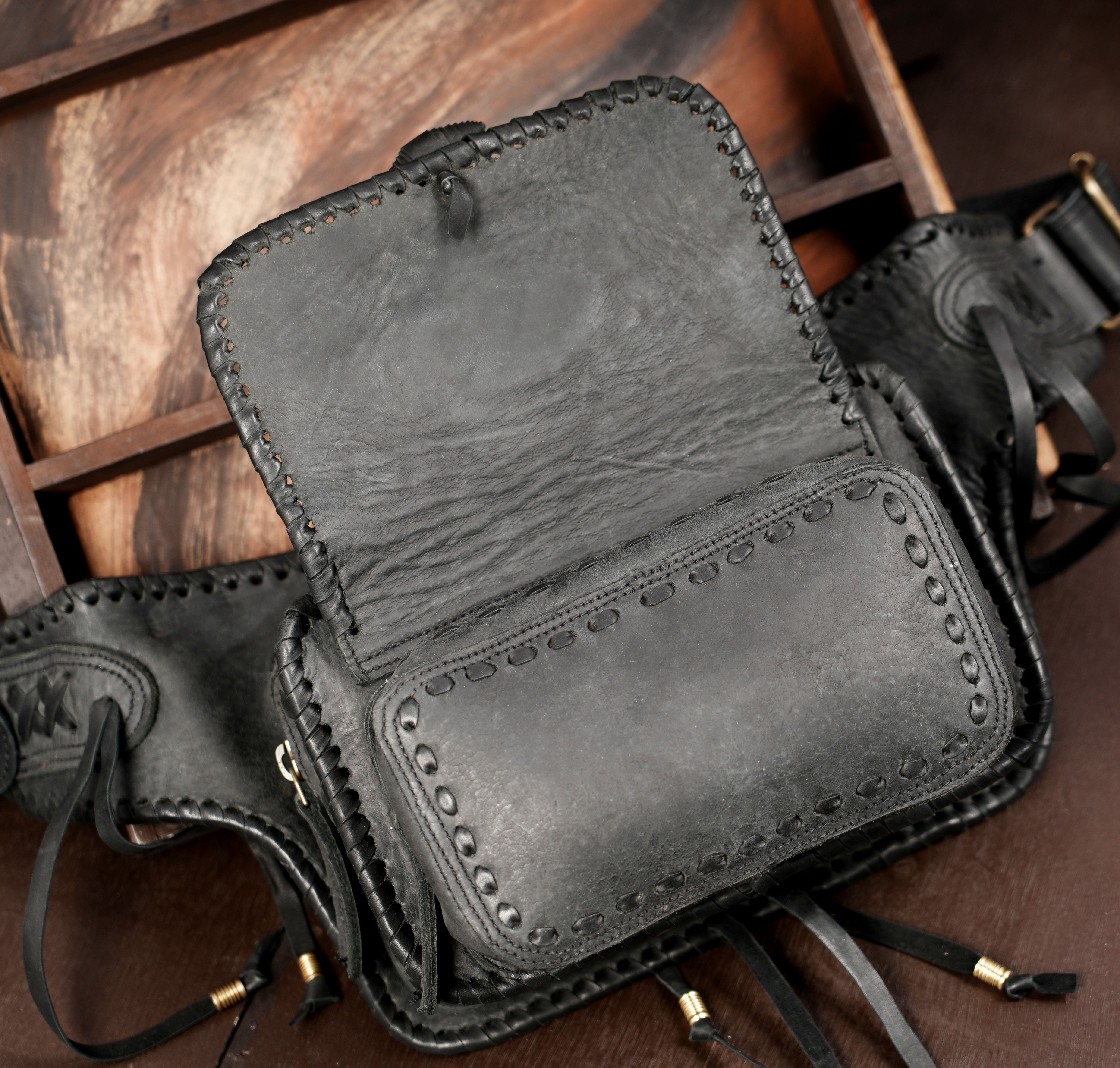 Leather crossbody bag with labradorite stone and braided trim