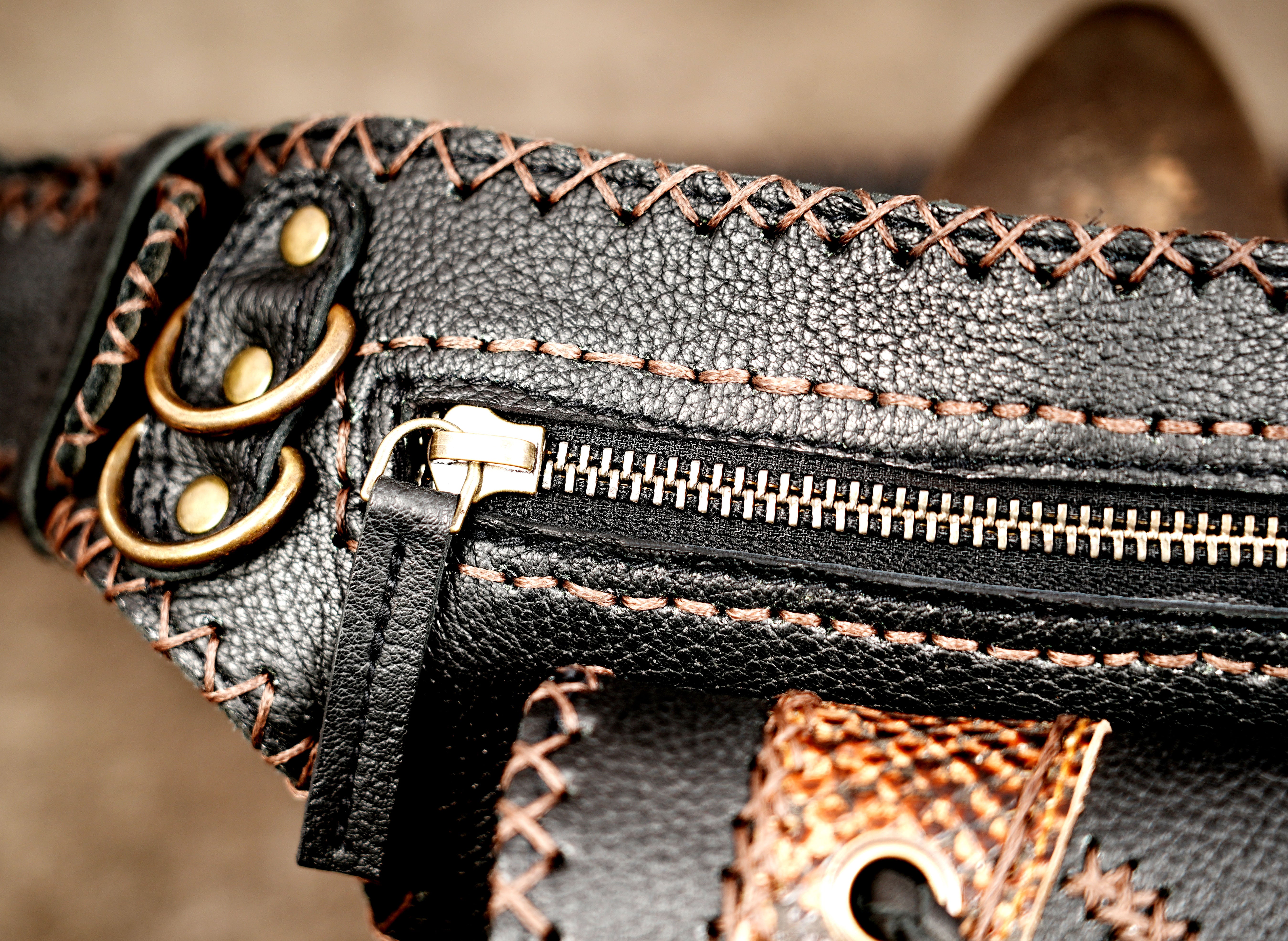 Leather festival pouch with tan and black patchwork leather detail