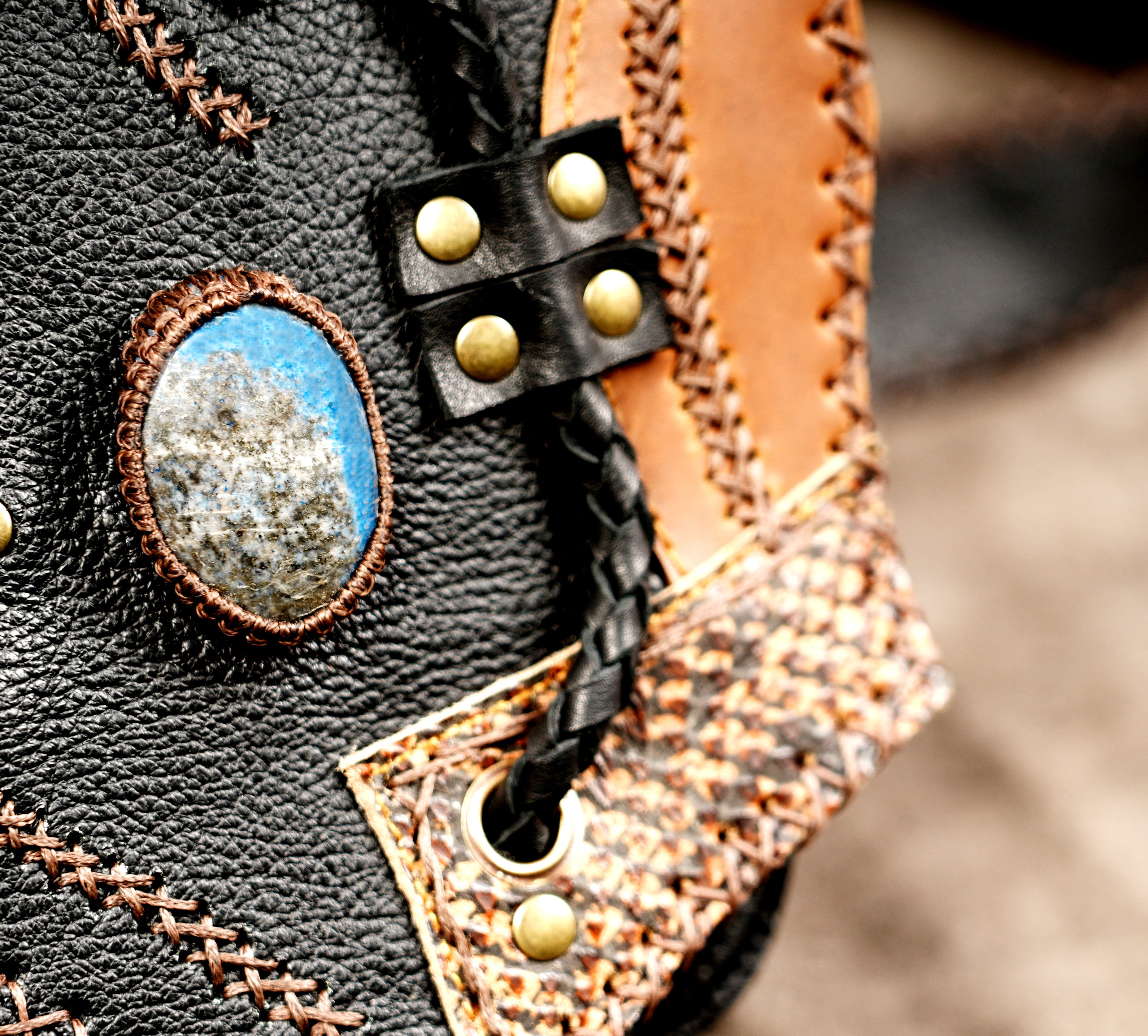 Leather waist bag with gemstone center and long adjustable strap