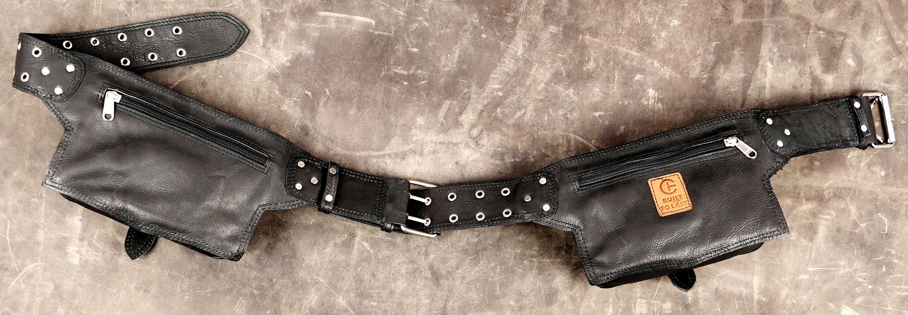 Leather workwear belt with double buckle pockets