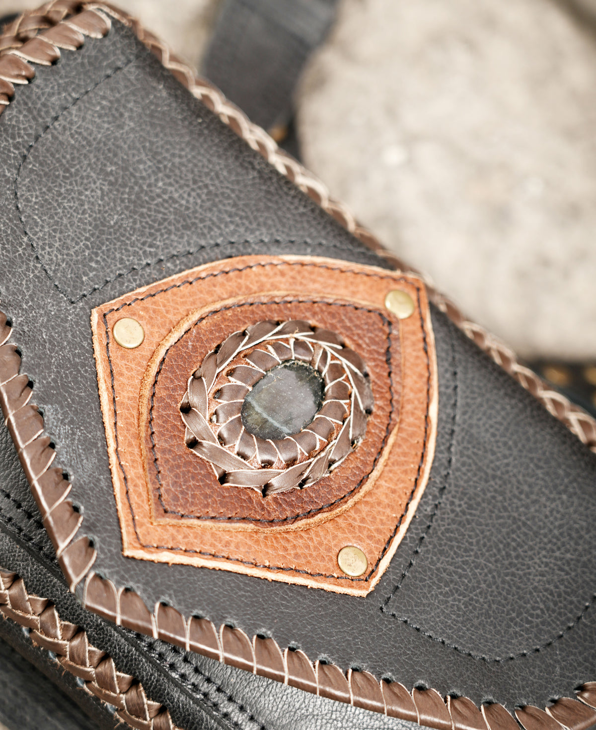Black leather festival holster harness with decorative stone details