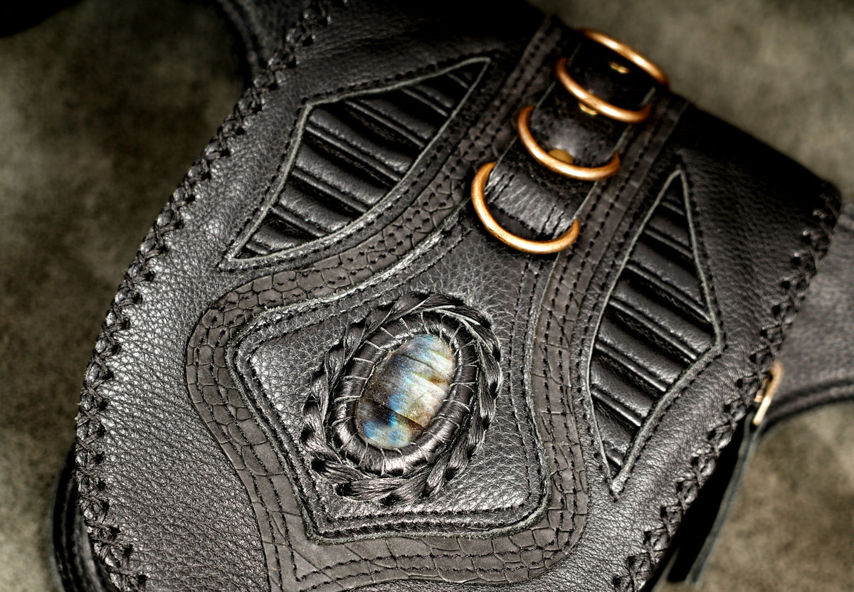 Black leather boho utility belt with gemstone details and adjustable buckle