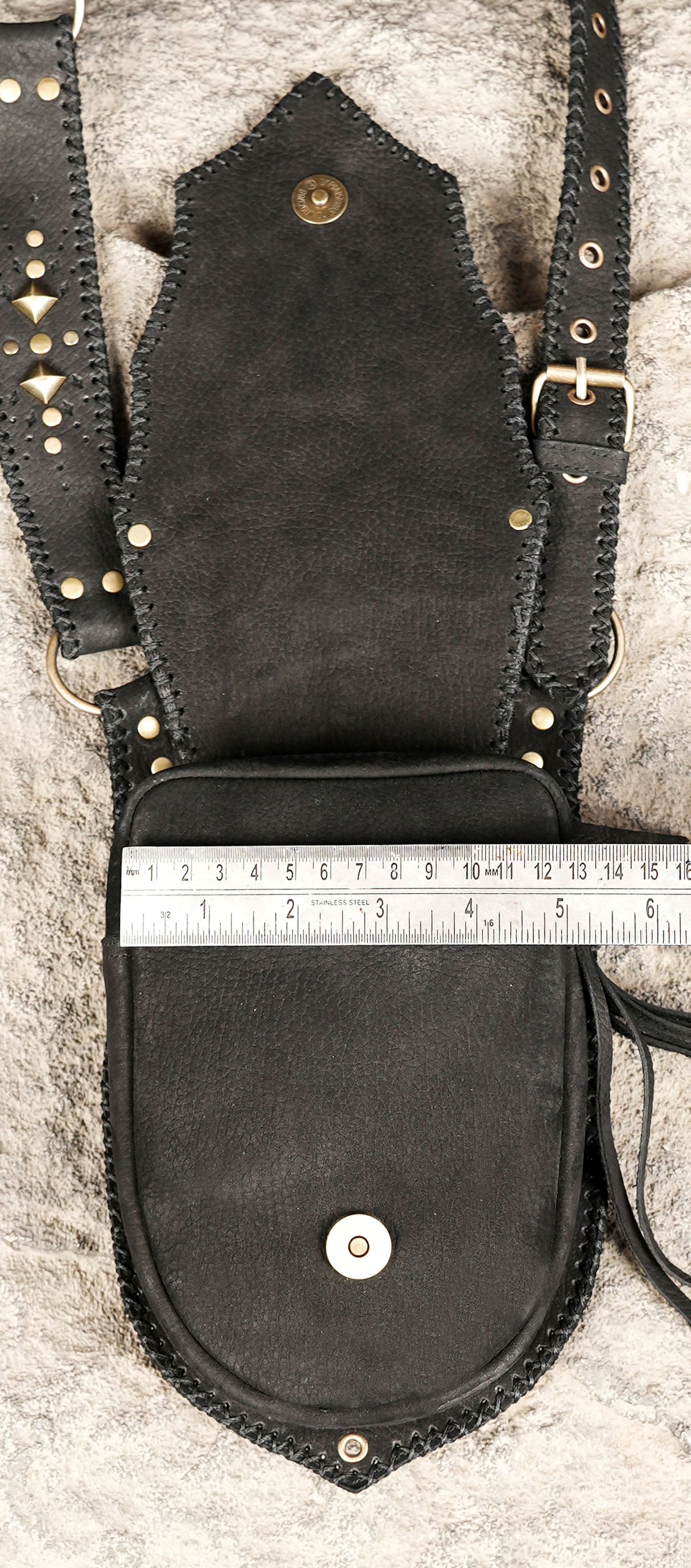 Black leather double thigh holster bag set for women and men at festivals, raves, cosplay events, and Burning Man.
