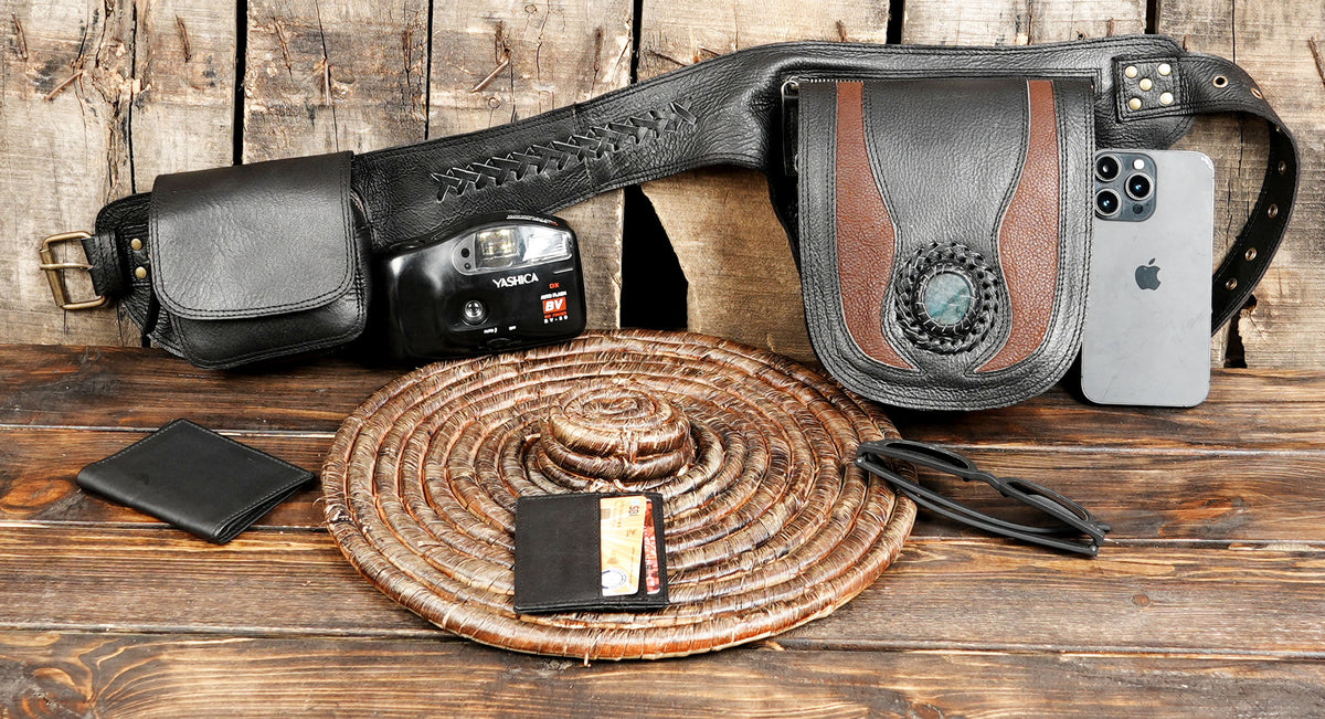 Brown and black leather pocket belt with turquoise stone detail for outdoor travel and events