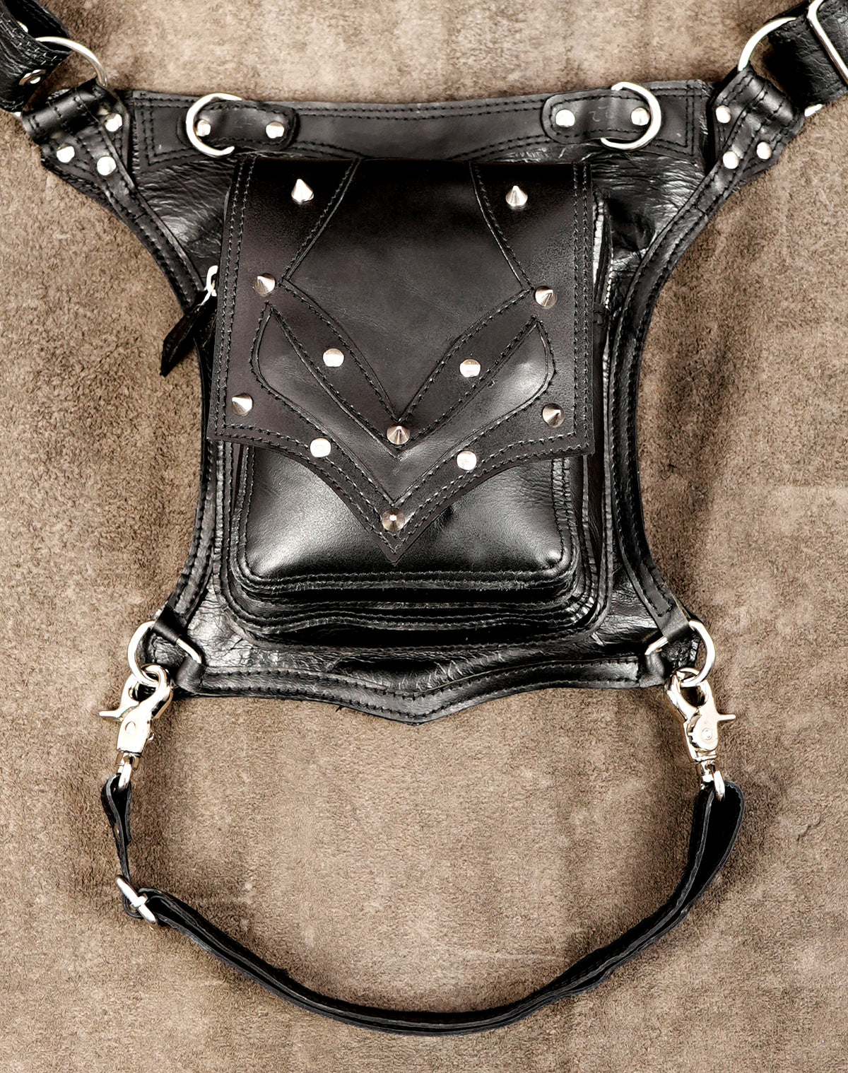 Minimalist leather leg holster, front symmetrical view