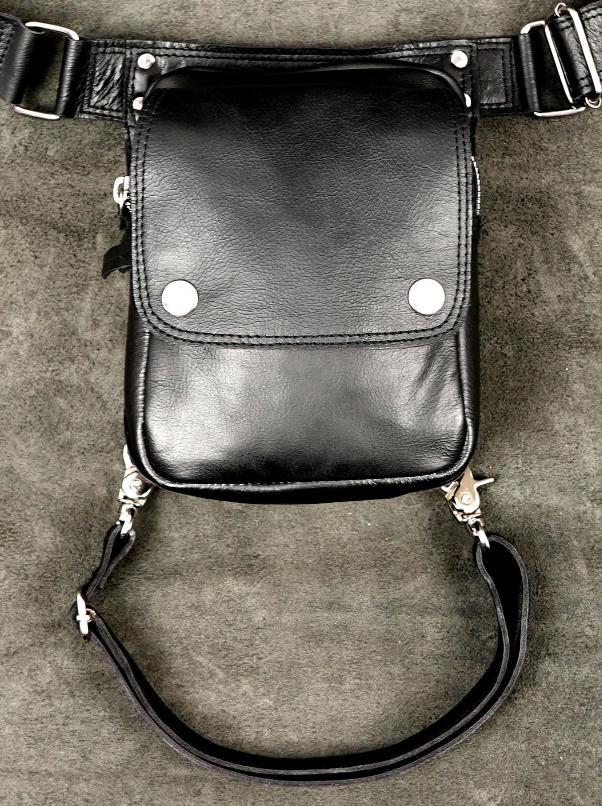 Minimalist leather leg holster, front symmetrical view