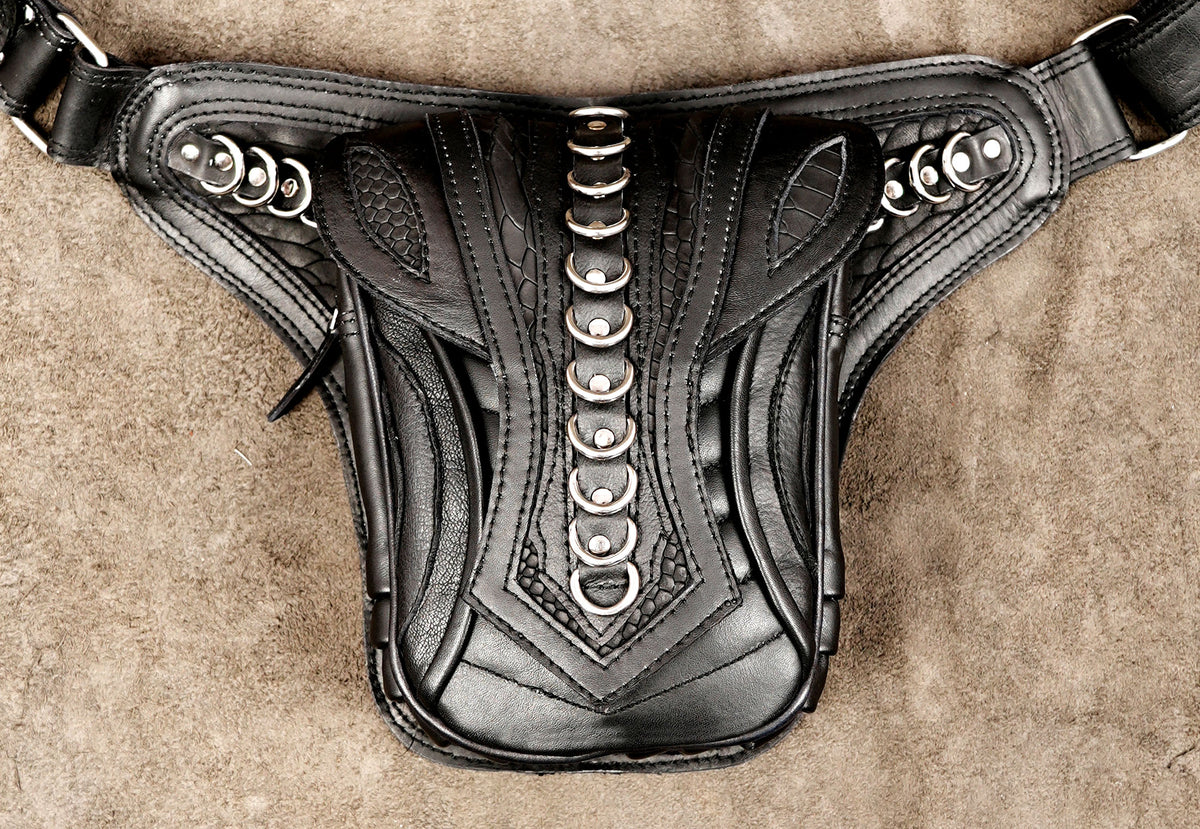 Motorcycle style leather waist bag with silver accents