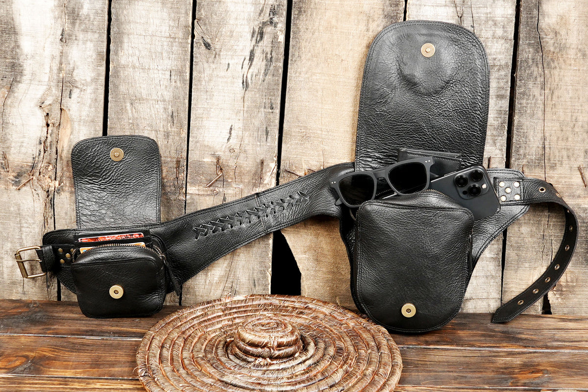 Unisex black and brown leather festival hip bag featuring stone inlay detail and dual flap pockets