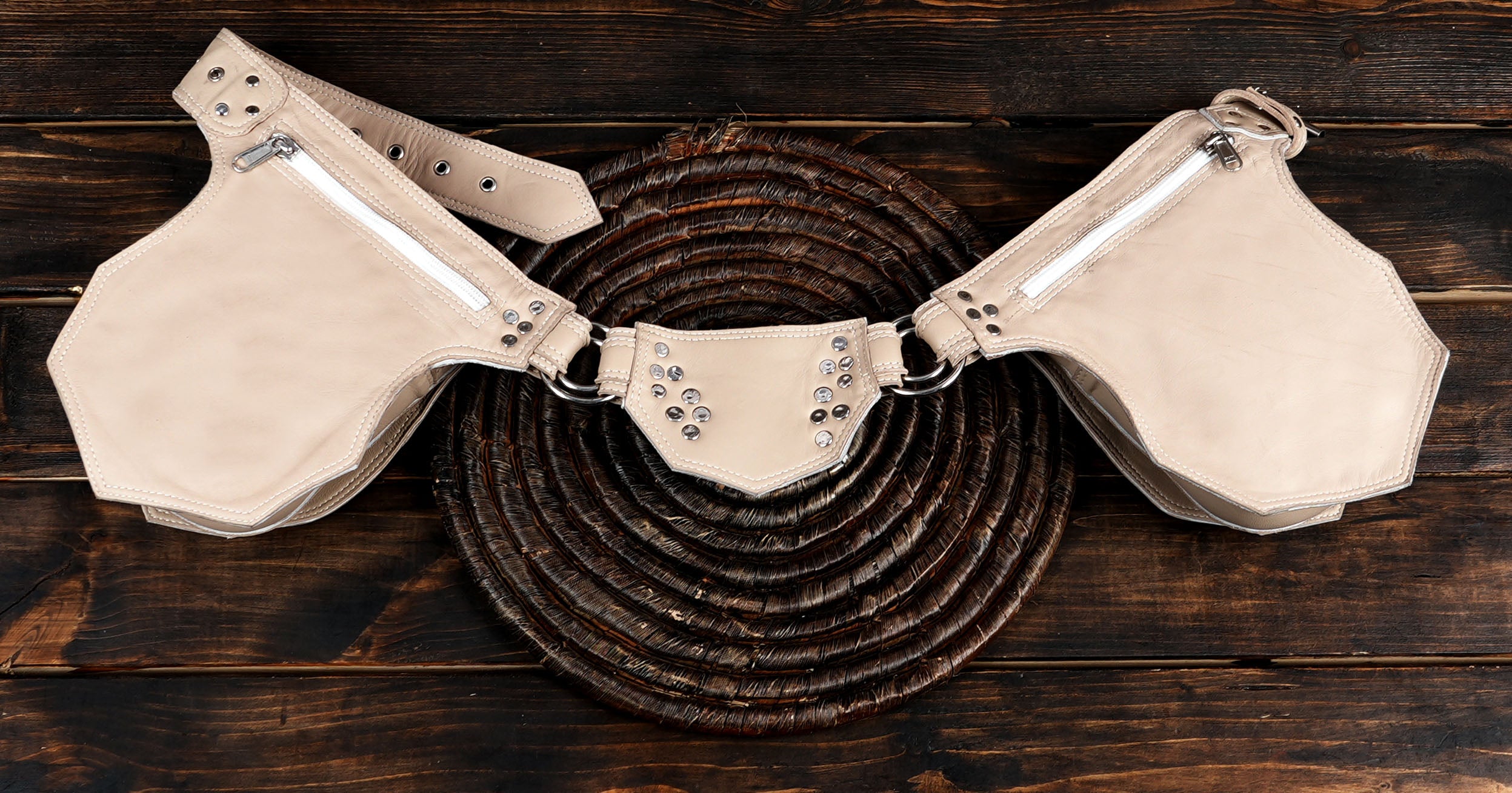 Neutral leather waist accessory, hardware detail shot