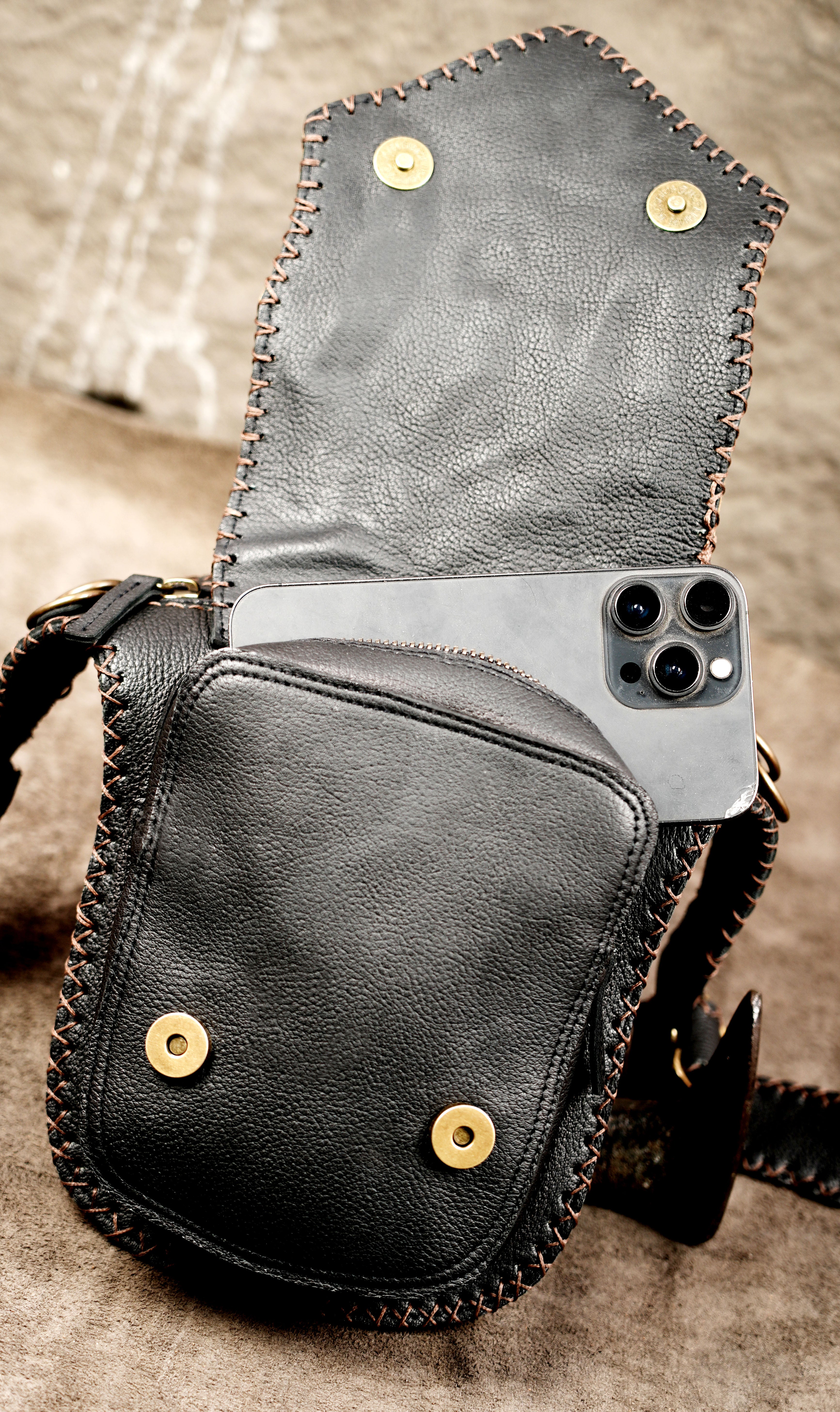 Patchwork leather festival bag with natural stone and stitching detail