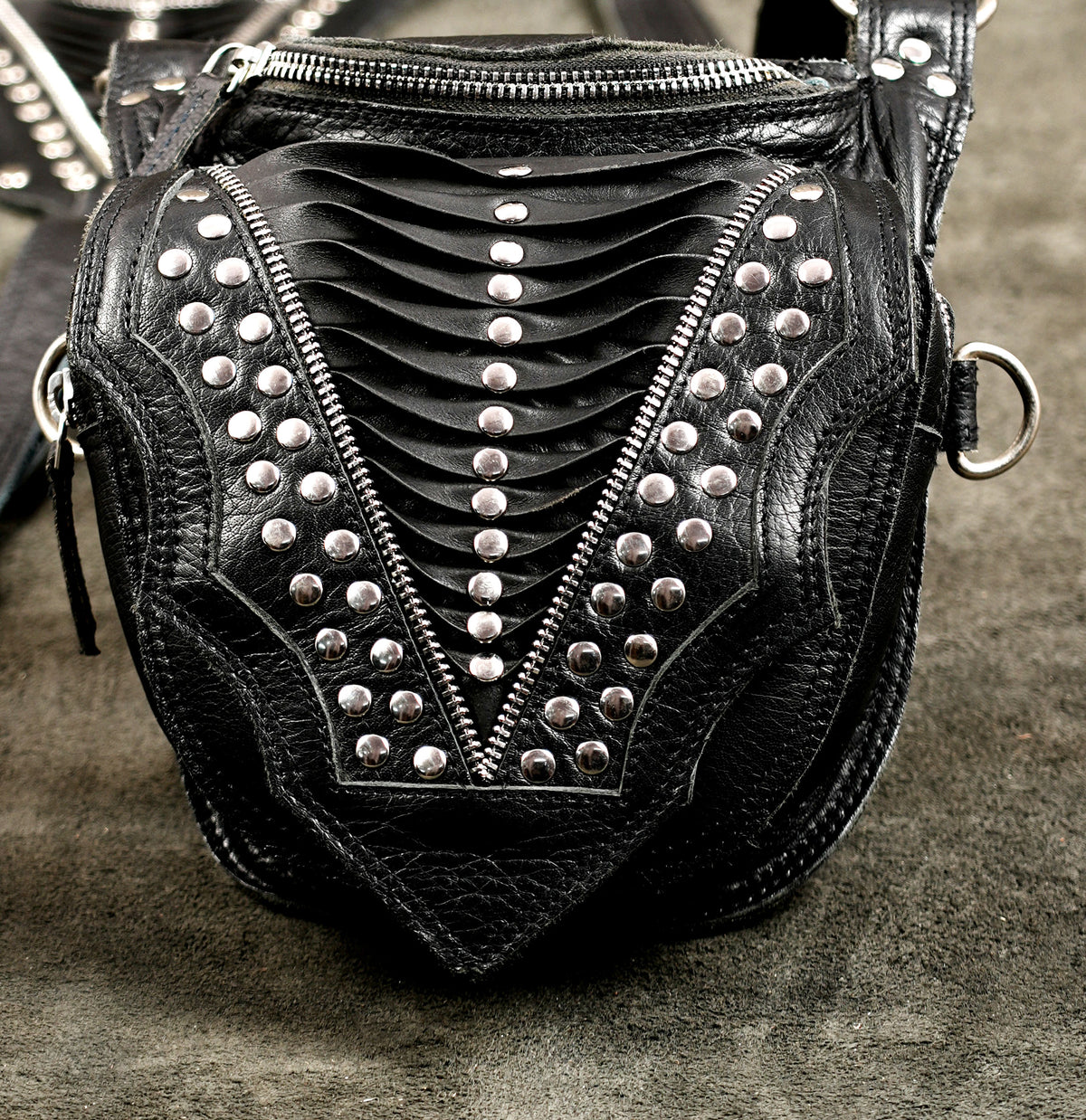 Punk leather harness with zip pockets and adjustable straps
