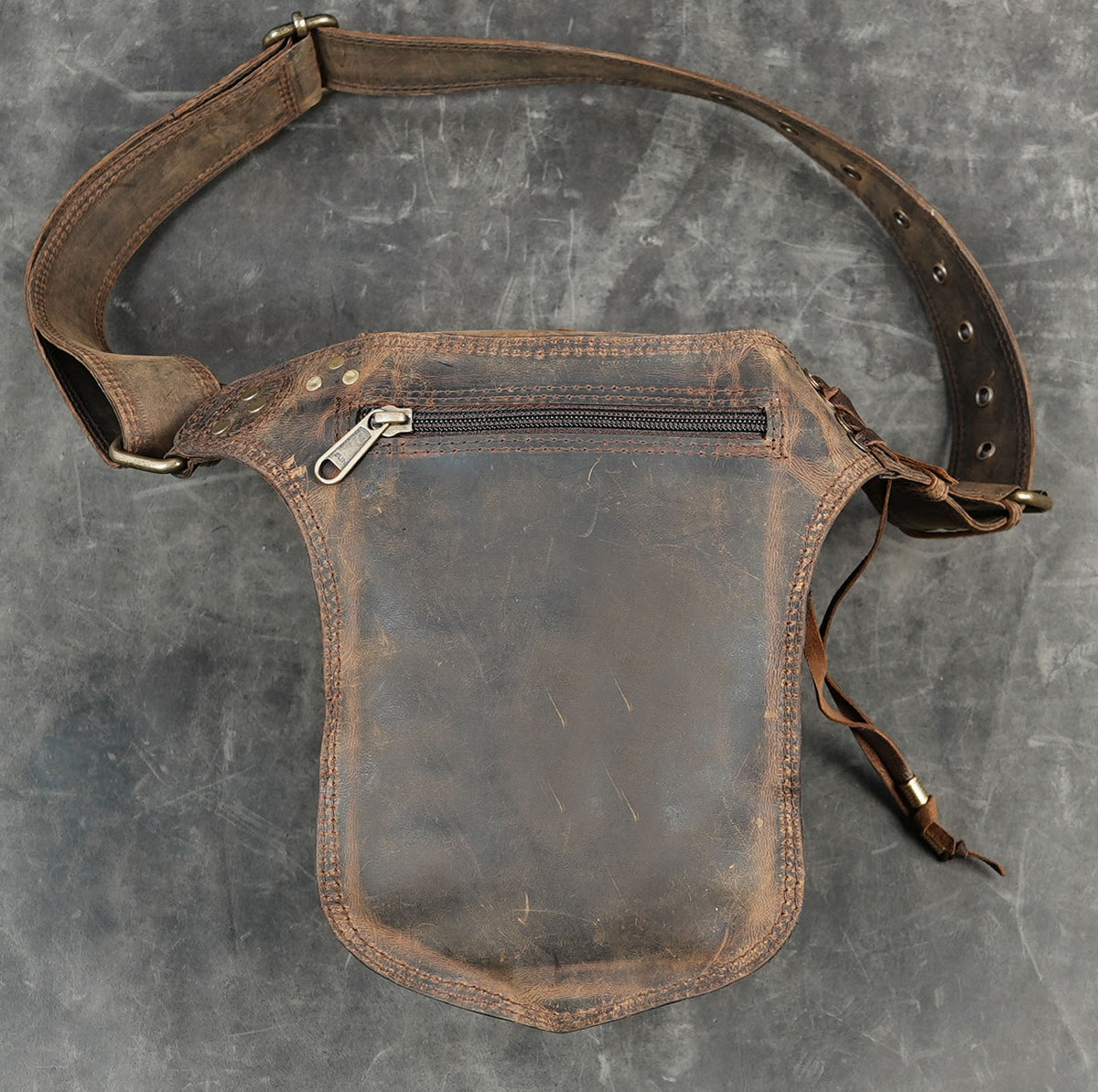 Handmade leather hip pouch for festivals travel and everyday use
