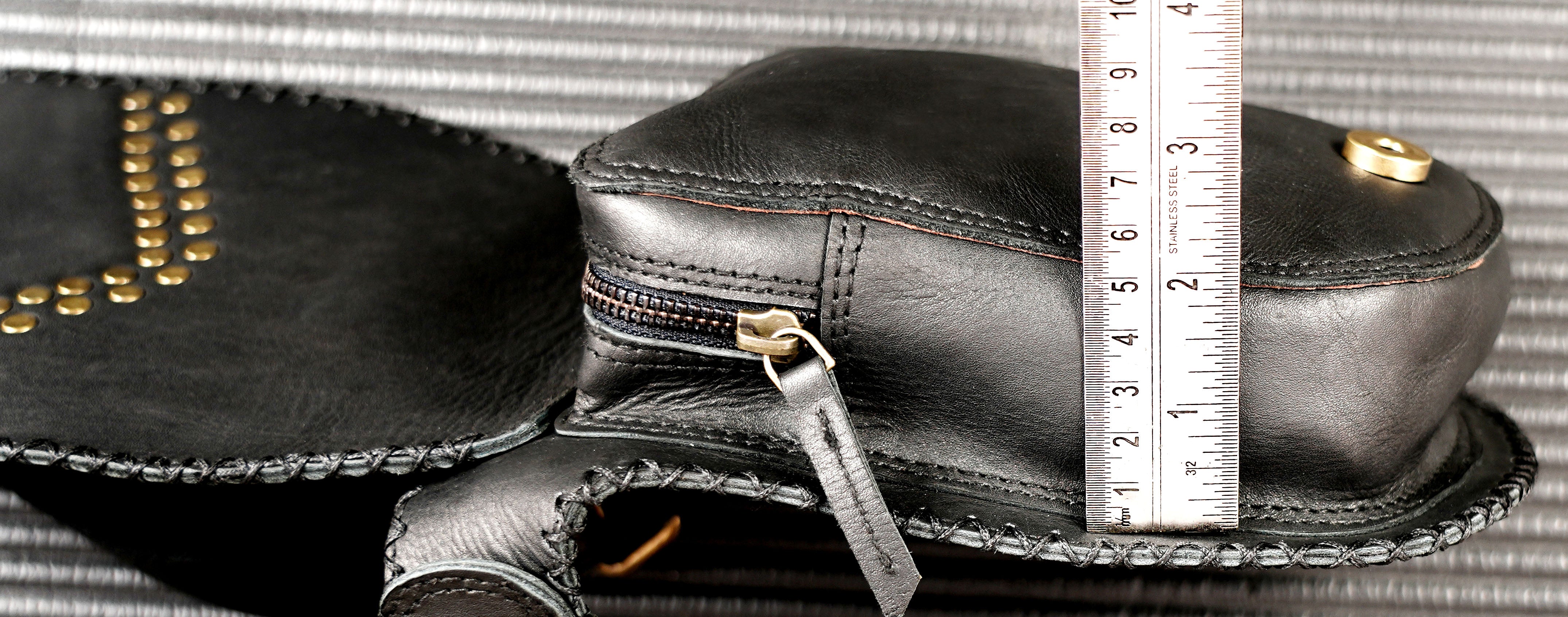 Statement leather waist accessory with a labradorite centerpiece
